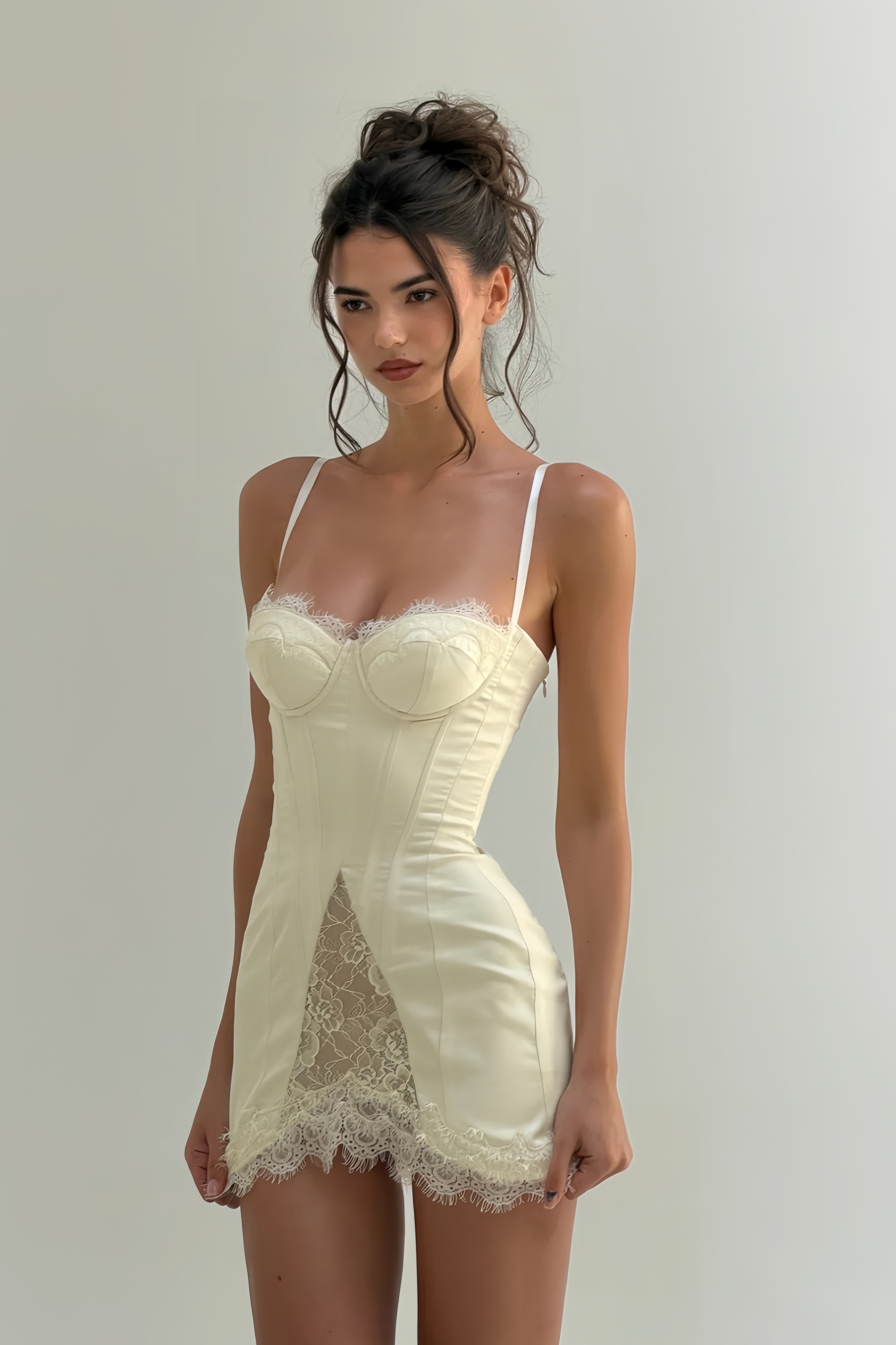 White satin corset mini dress with lace inserts and trim