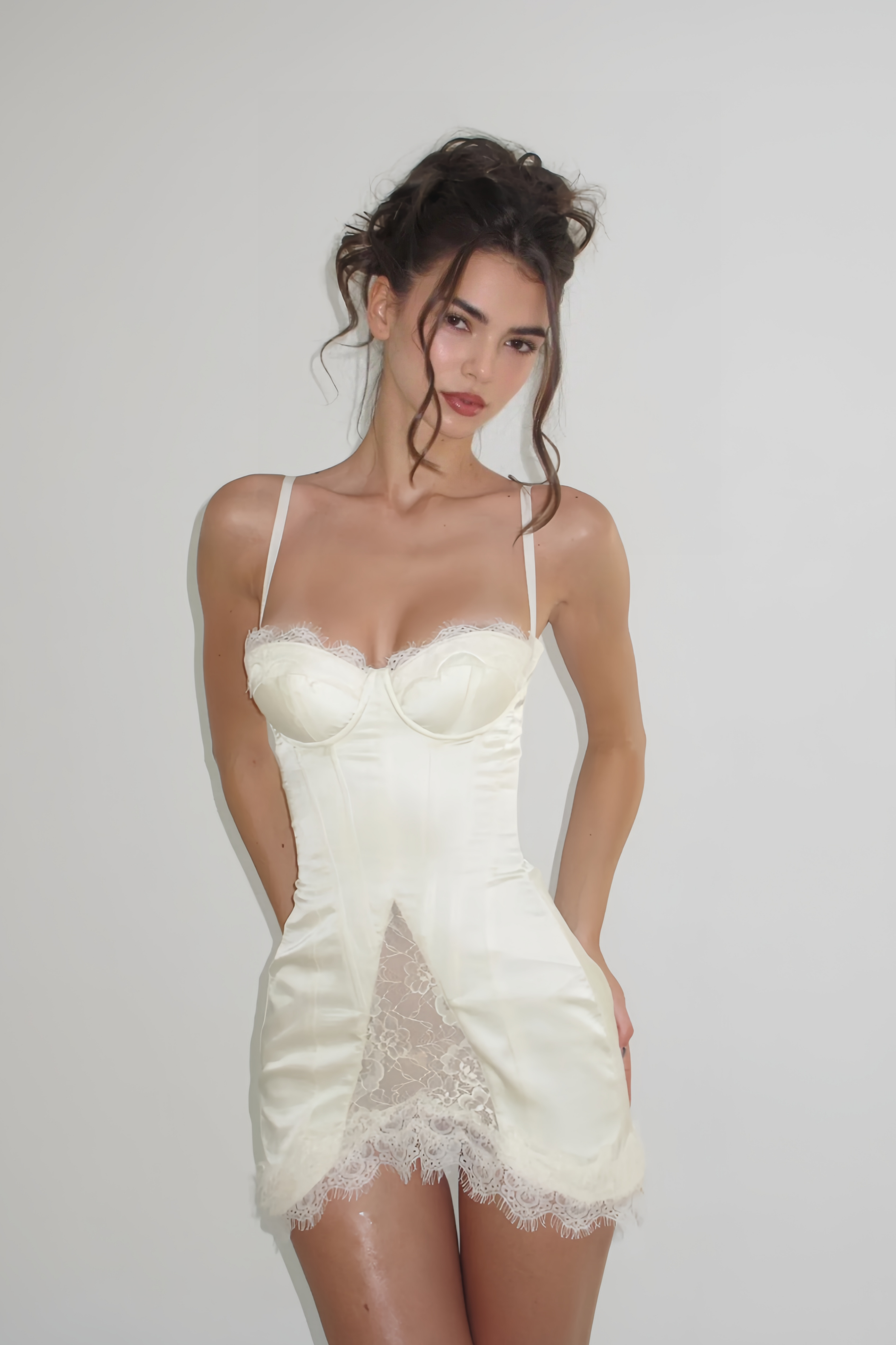 White satin corset mini dress with lace inserts and trim