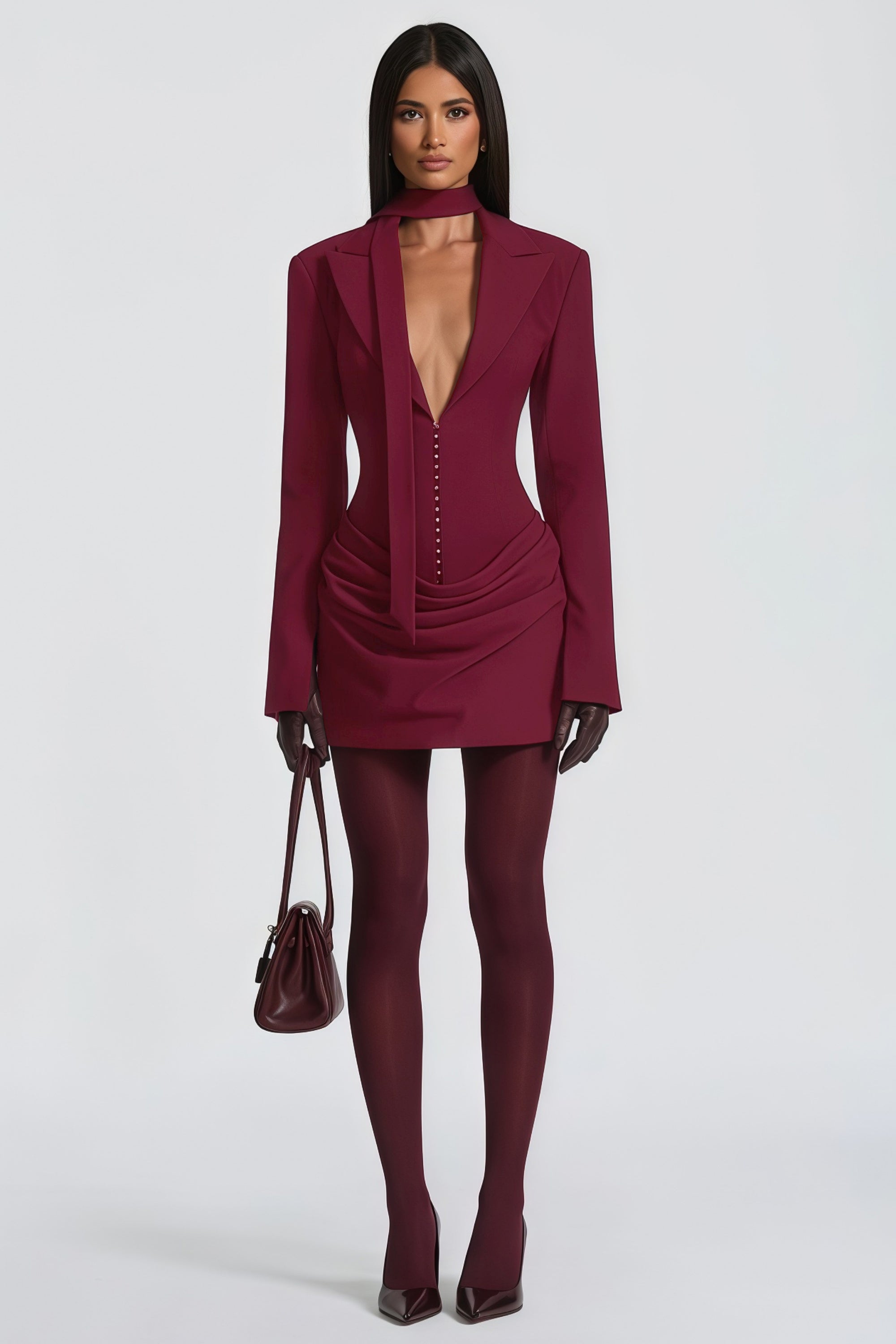 Burgundy long-sleeve blazer mini dress with a draped skirt
