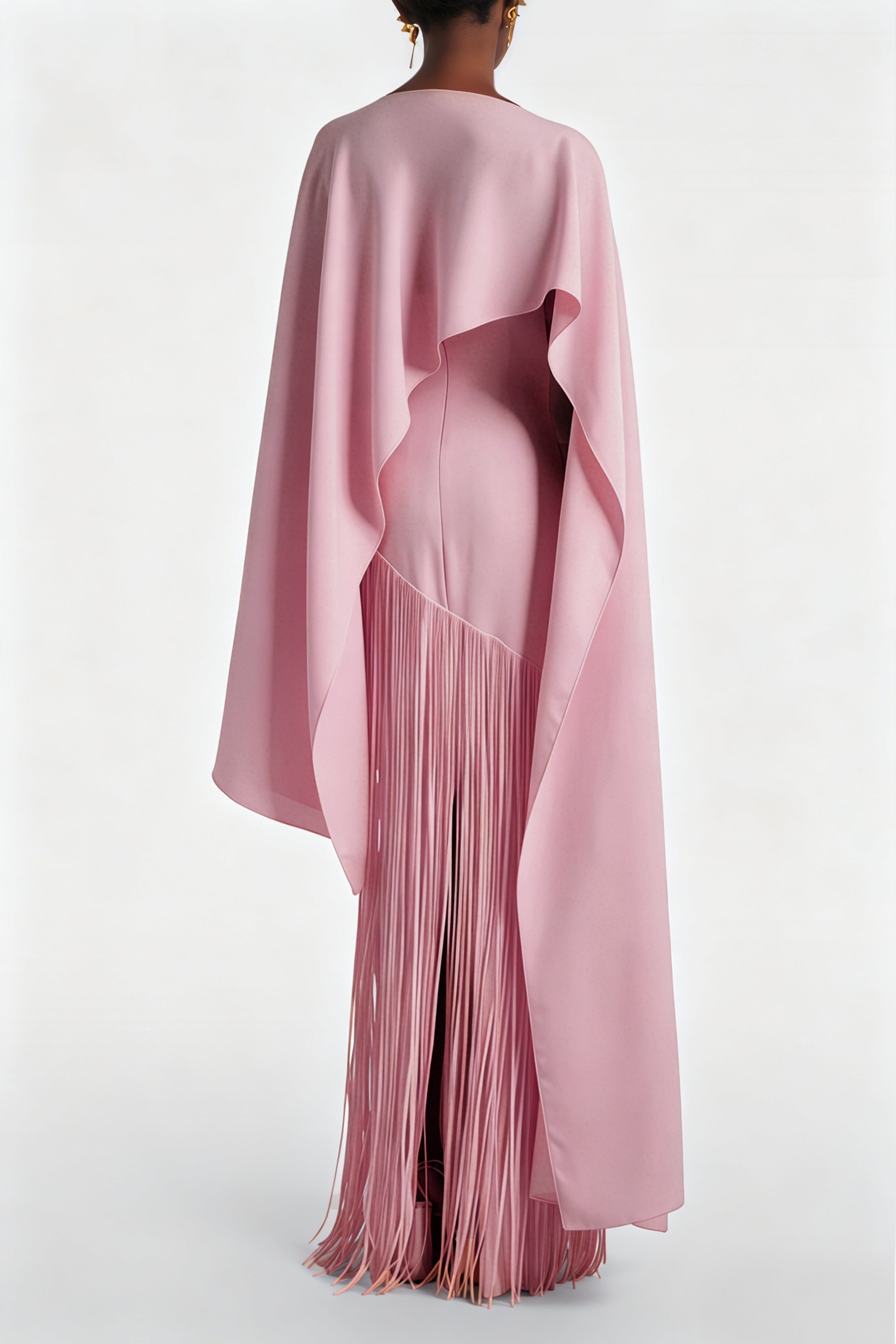 Mauve pink cape-style gown with a long fringed skirt