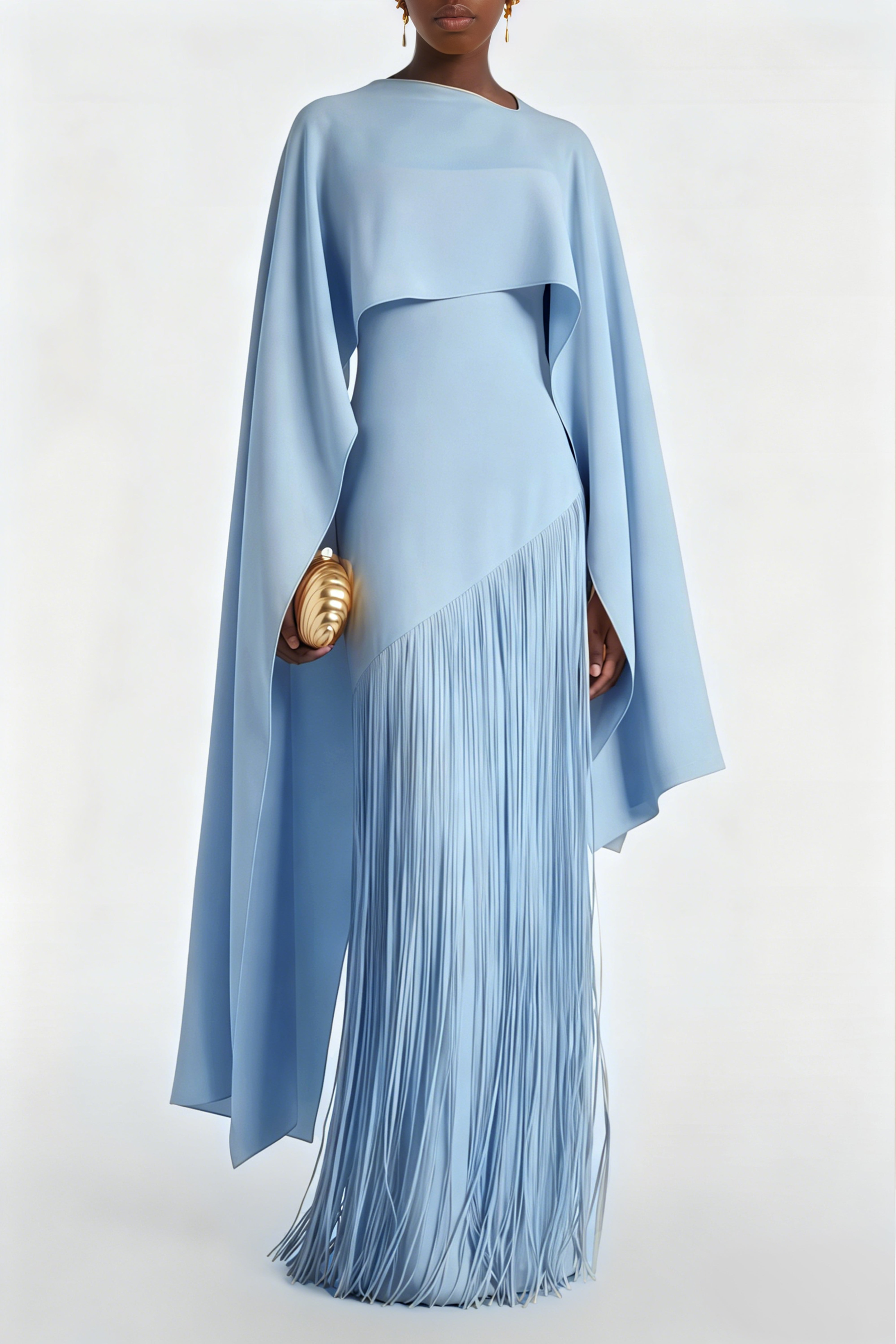 Light blue cape-style gown with a long fringed skirt