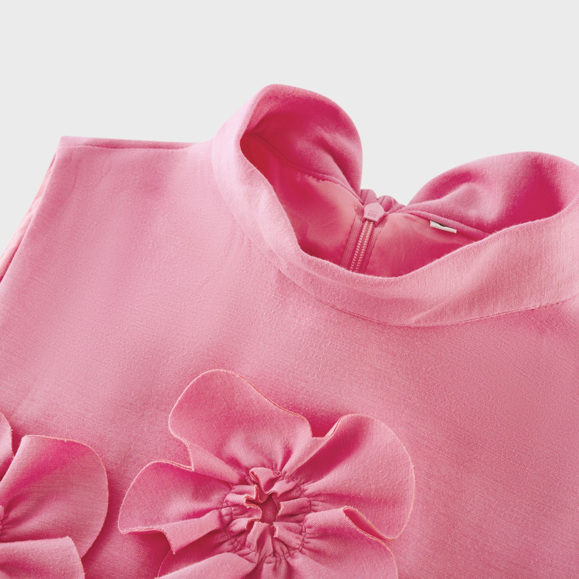 Pink sleeveless high-neck midi dress with 3D floral embellishments