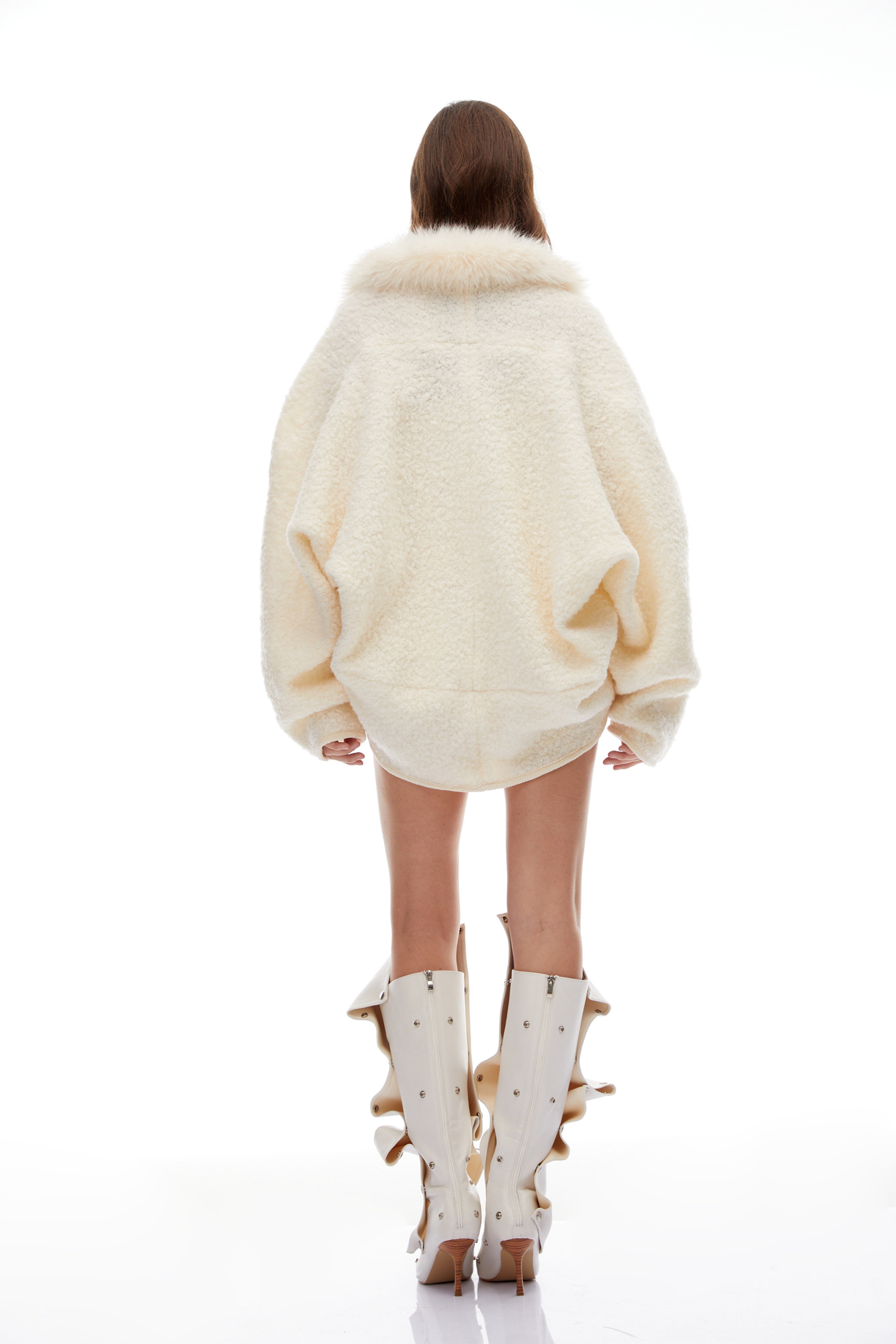 Veste courte en fausse fourrure