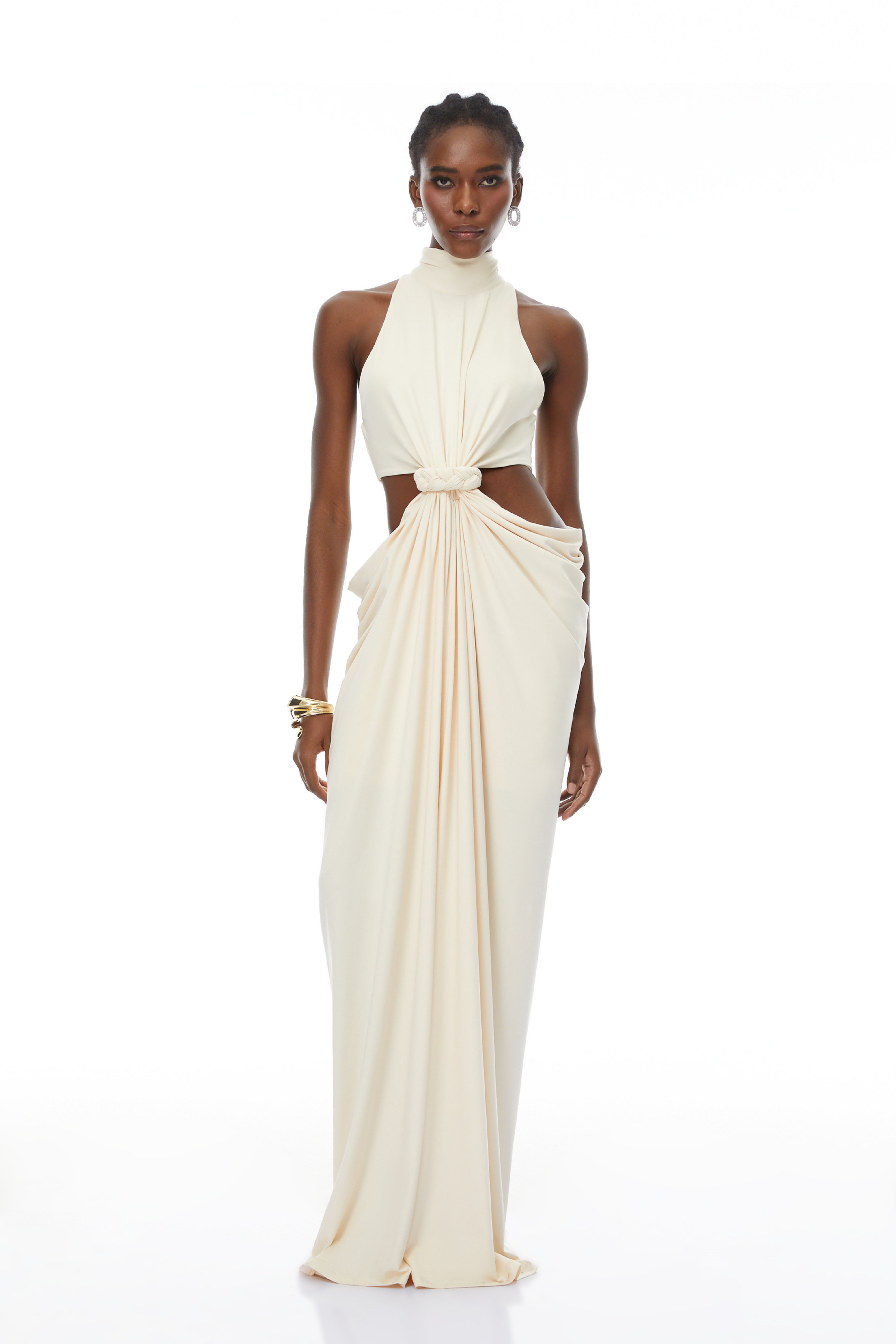 Cream halter maxi dress with waist cutouts and a knotted draped bodice