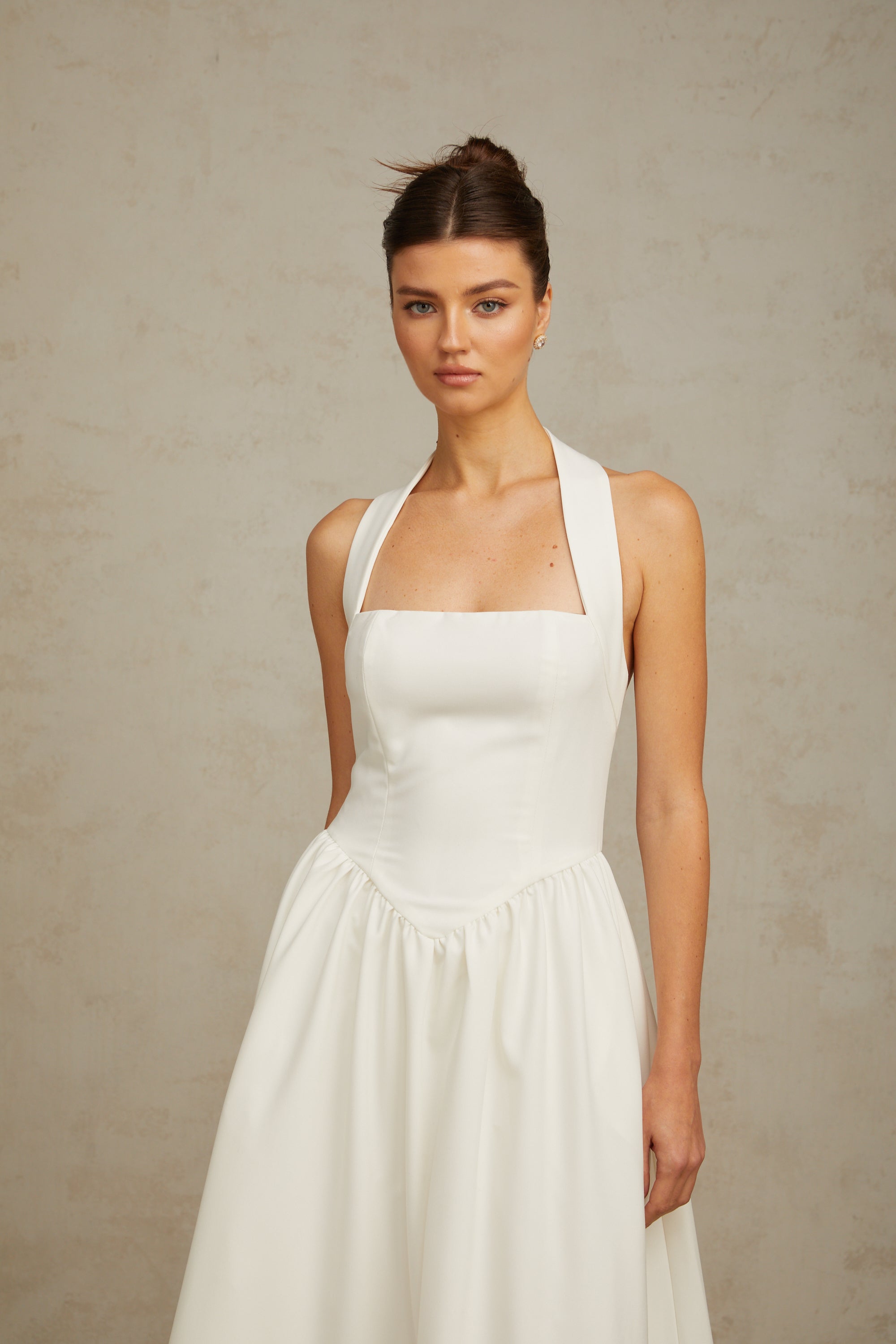 Alizée halterneck pleated midi dress in White (Final Sale)