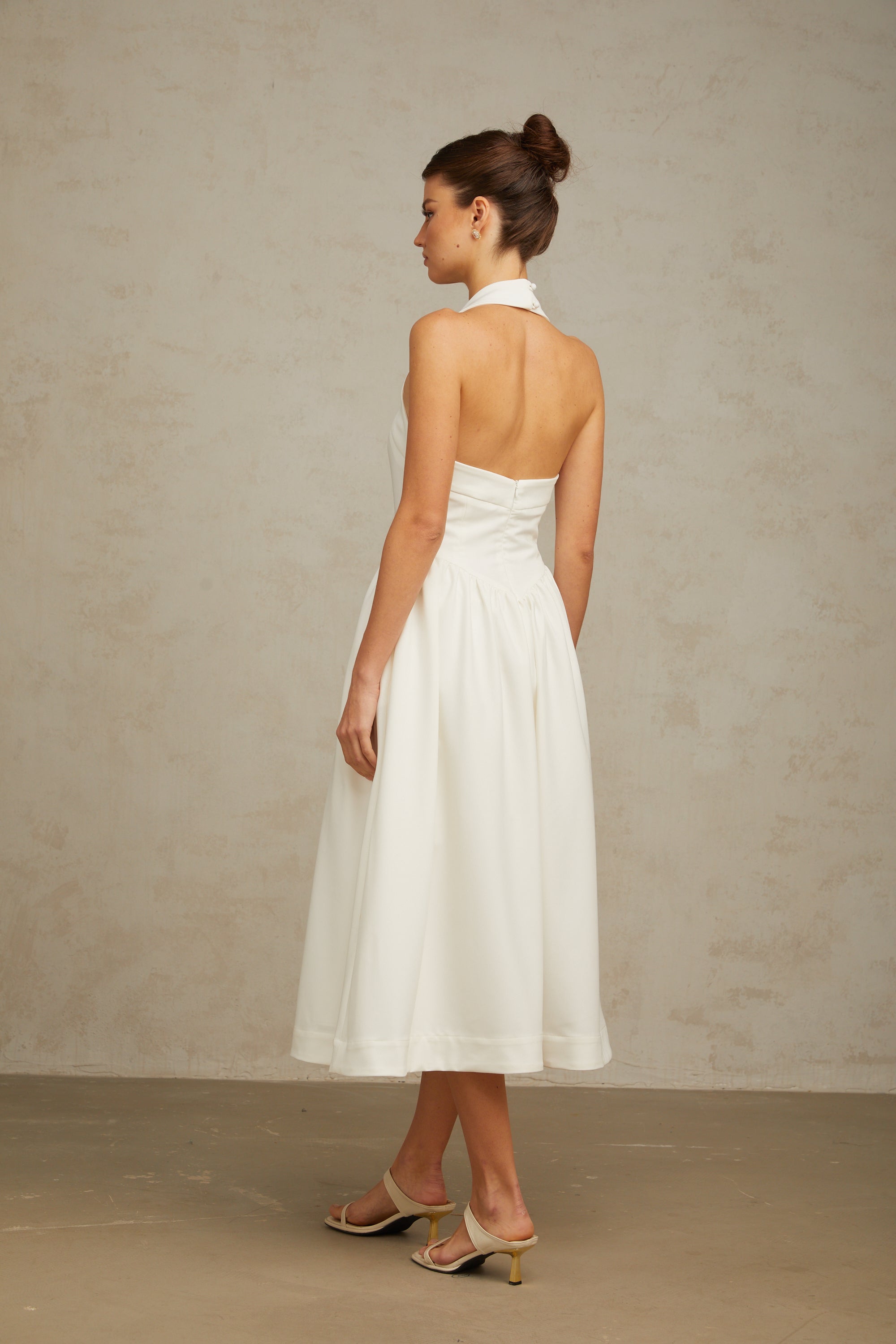 Alizée halterneck pleated midi dress in White (Final Sale)
