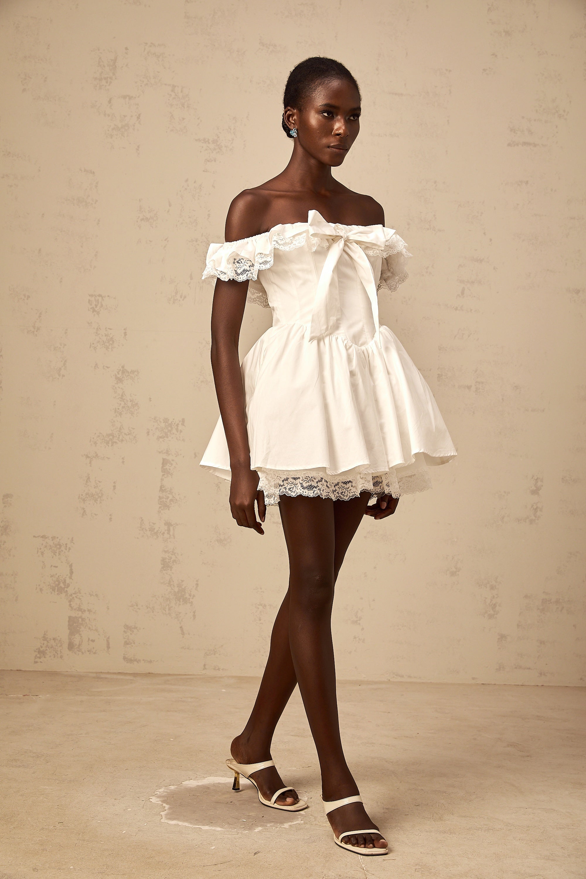Arsène white oversize-bow ruffled mini dress (Final Sale)