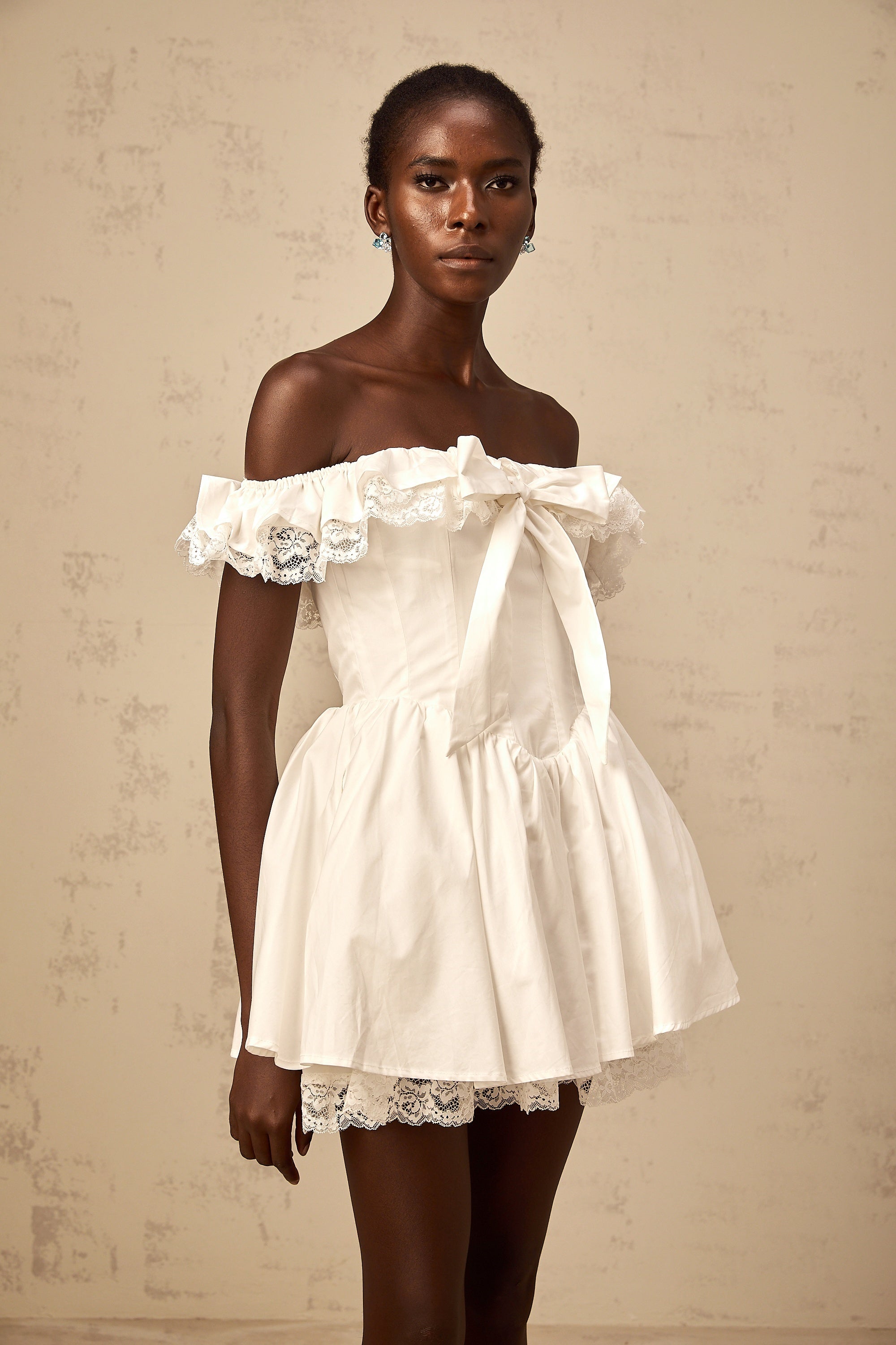 Arsène white oversize-bow ruffled mini dress (Final Sale)