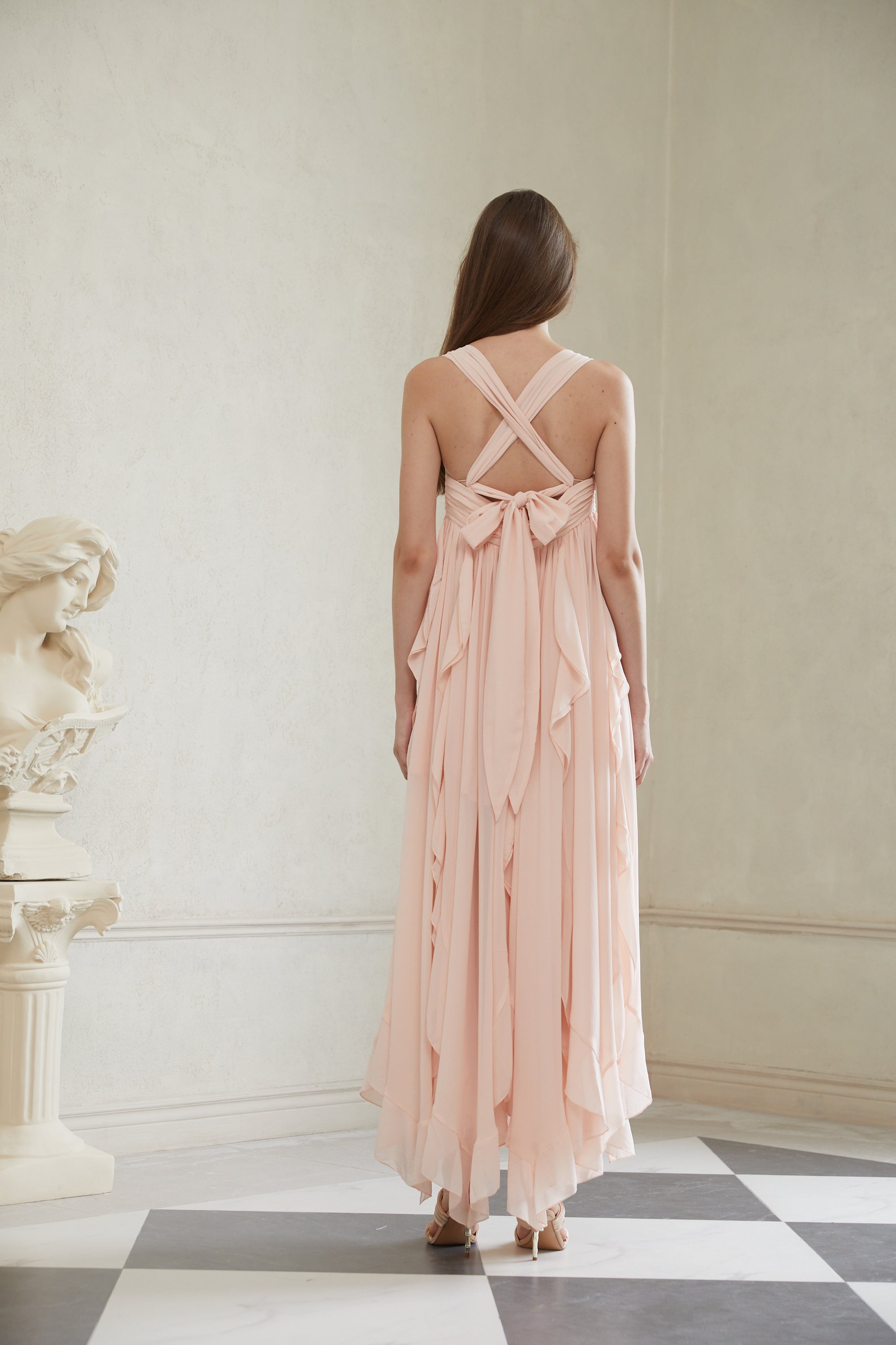 Robe longue en mousseline à volants rose Eos