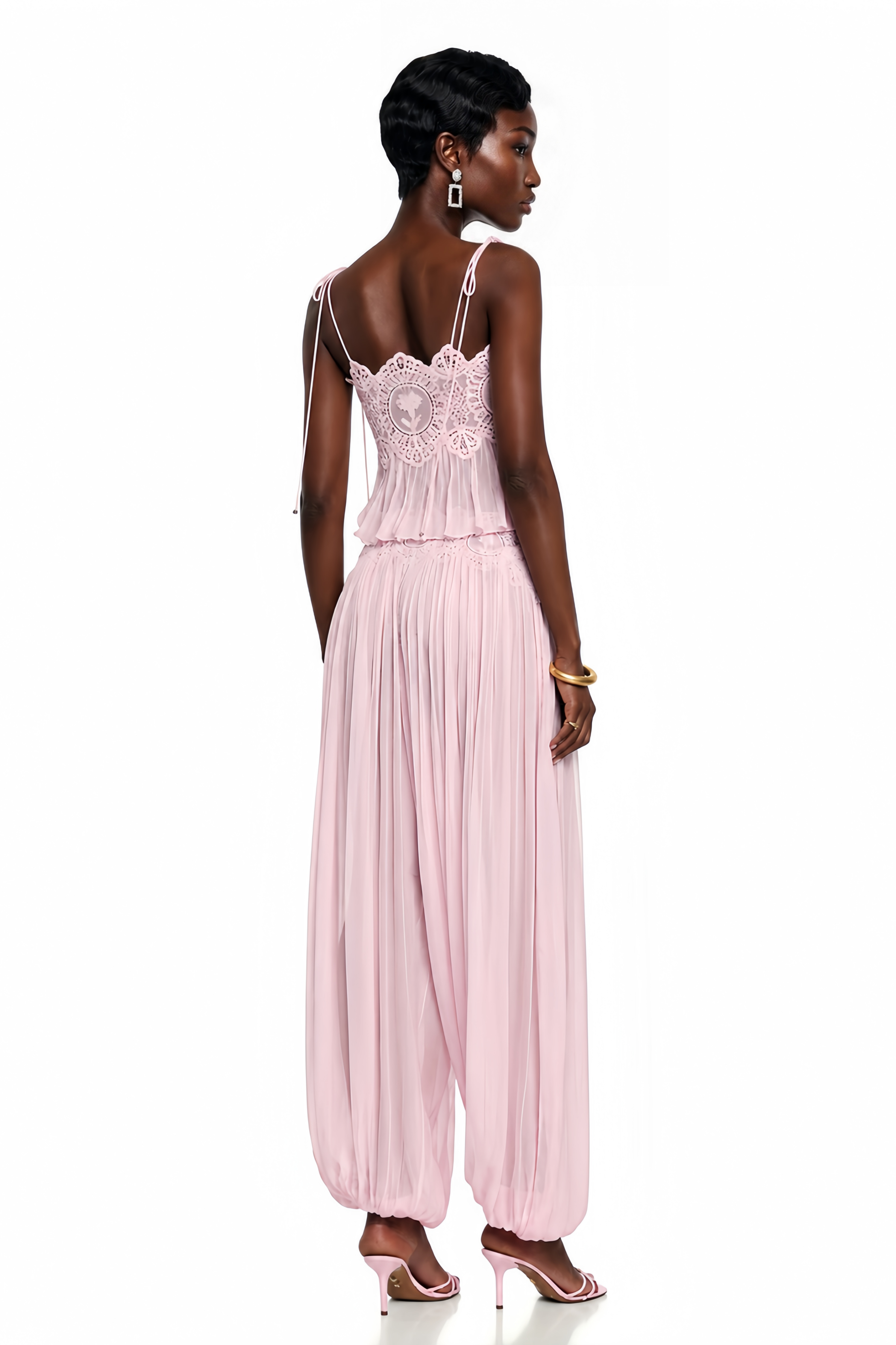 Light pink pleated two-piece set featuring a lace-trimmed camisole crop top and matching wide-leg harem pants