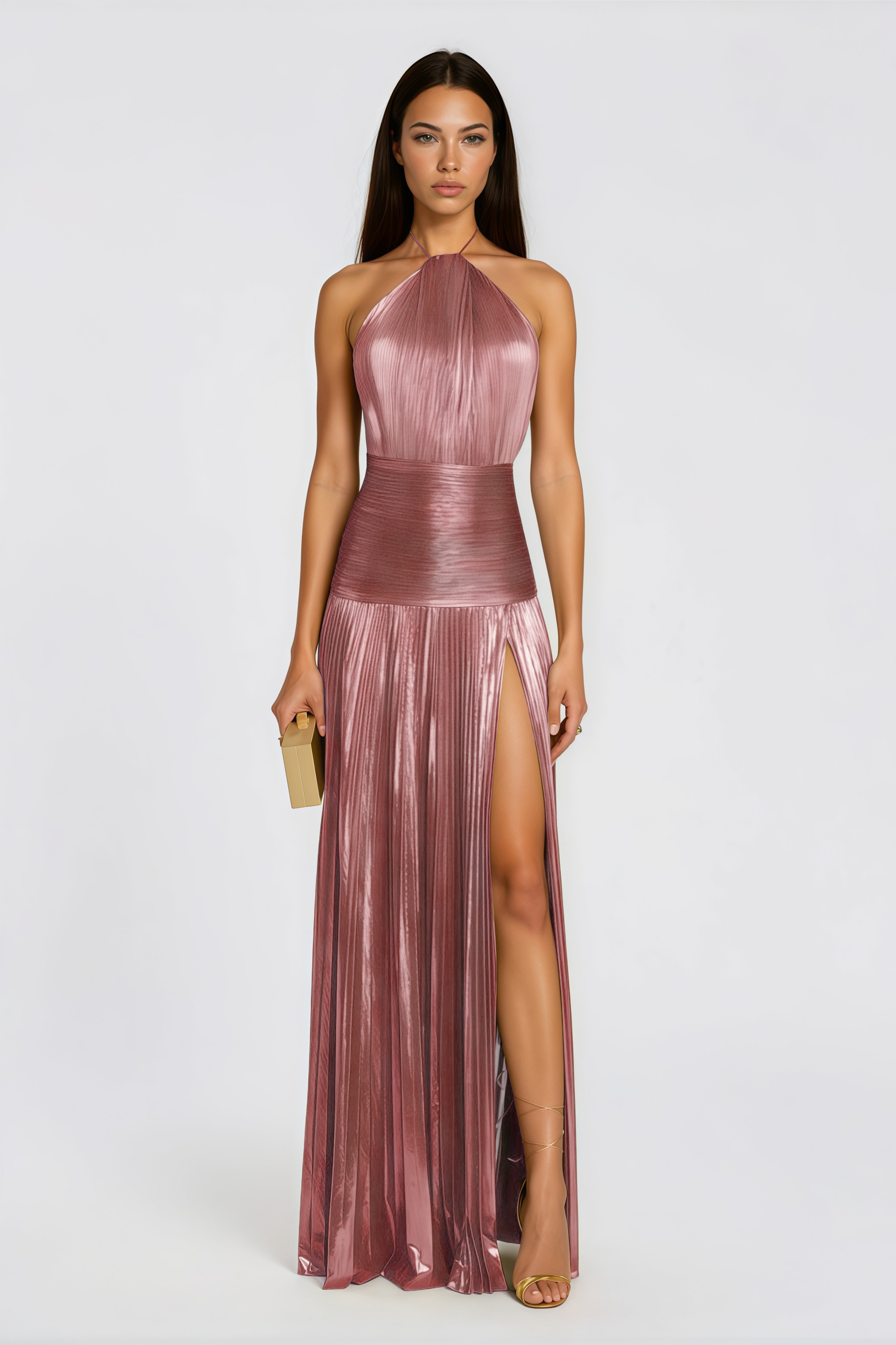 Metallic rose pink pleat halter gown with a cinched waist and high leg slit