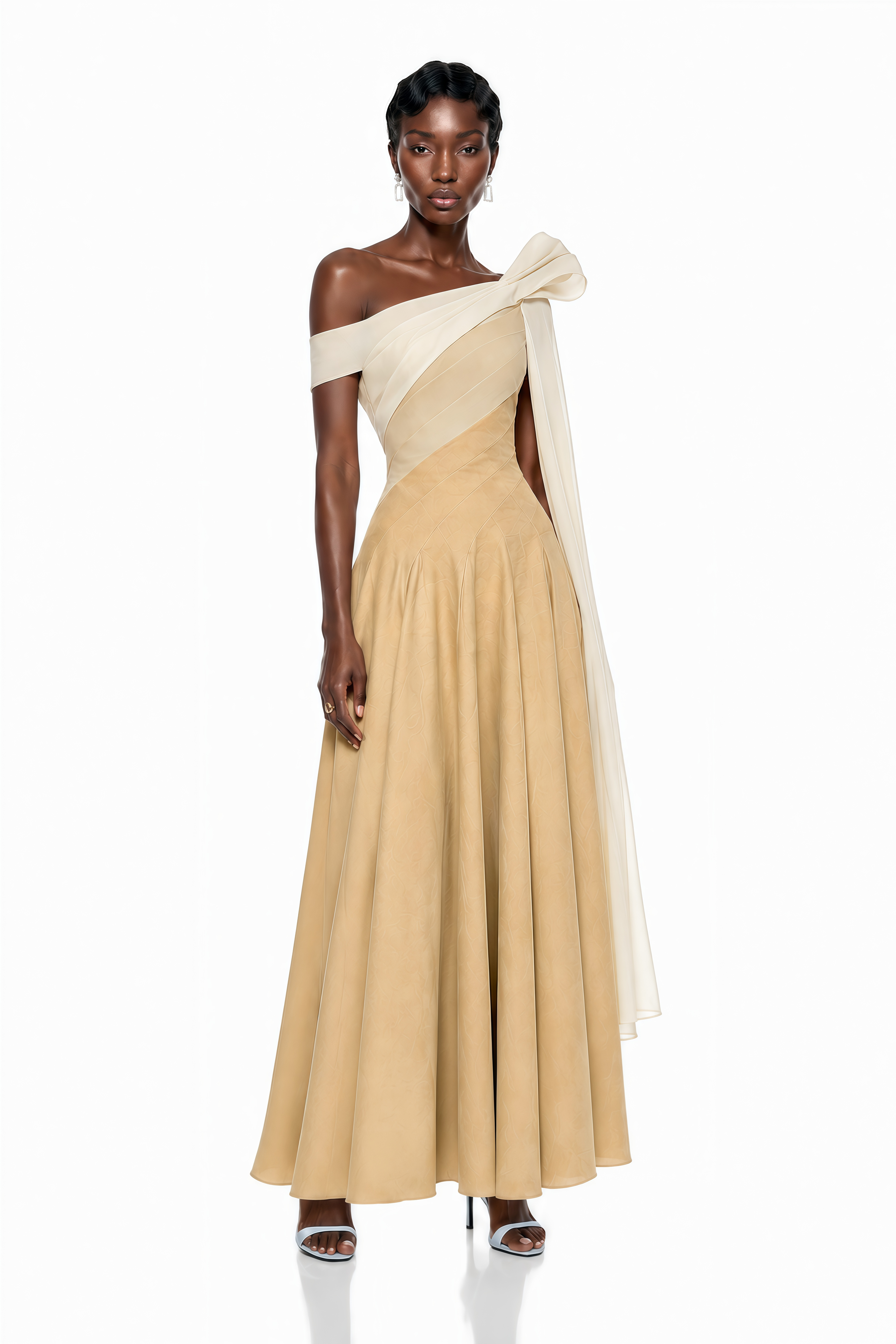 Beige maxi dress with a cream off-the-shoulder neckline, long trailing sash, and A-line skirt