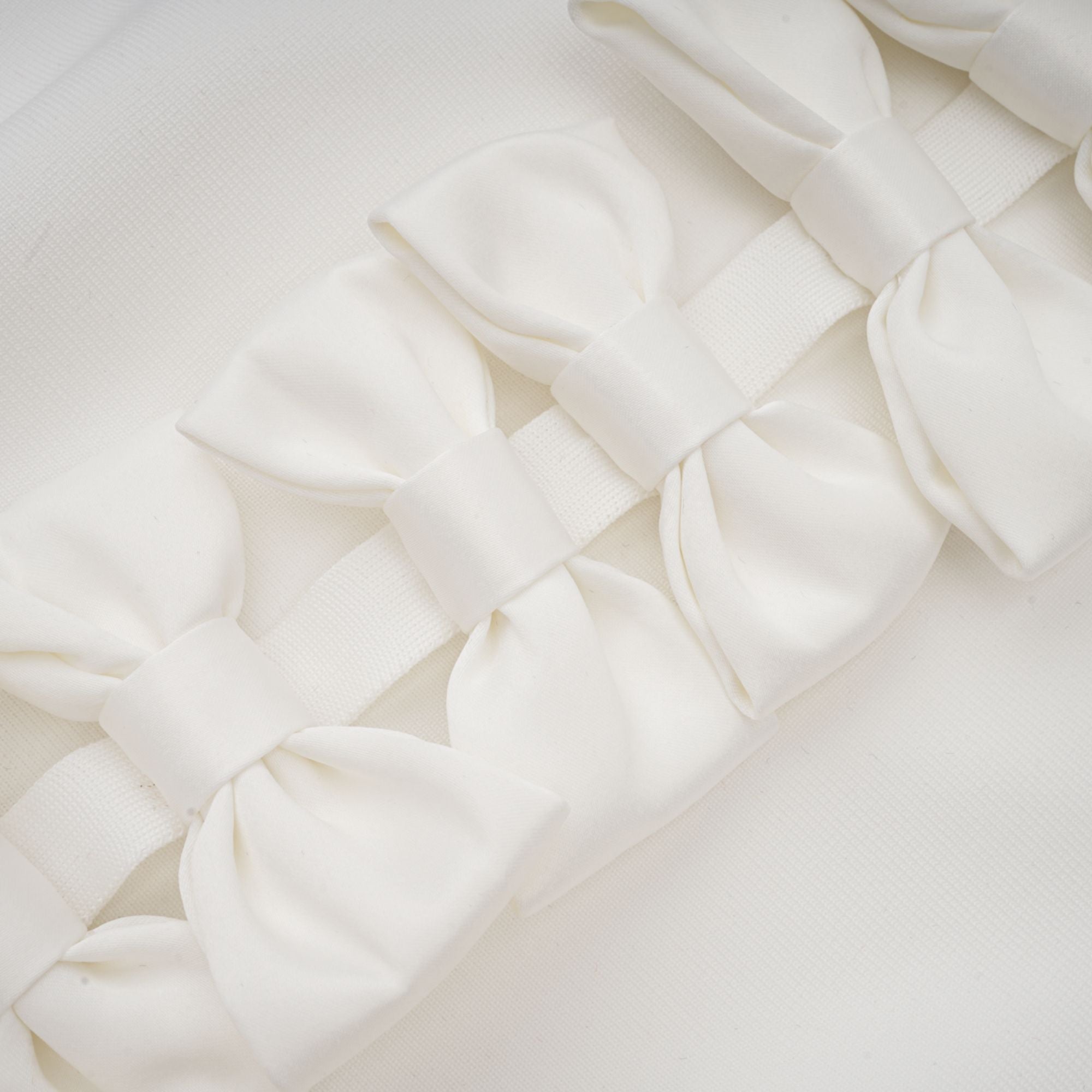 Capucine white oversize-bow bandage dress (Final Sale)