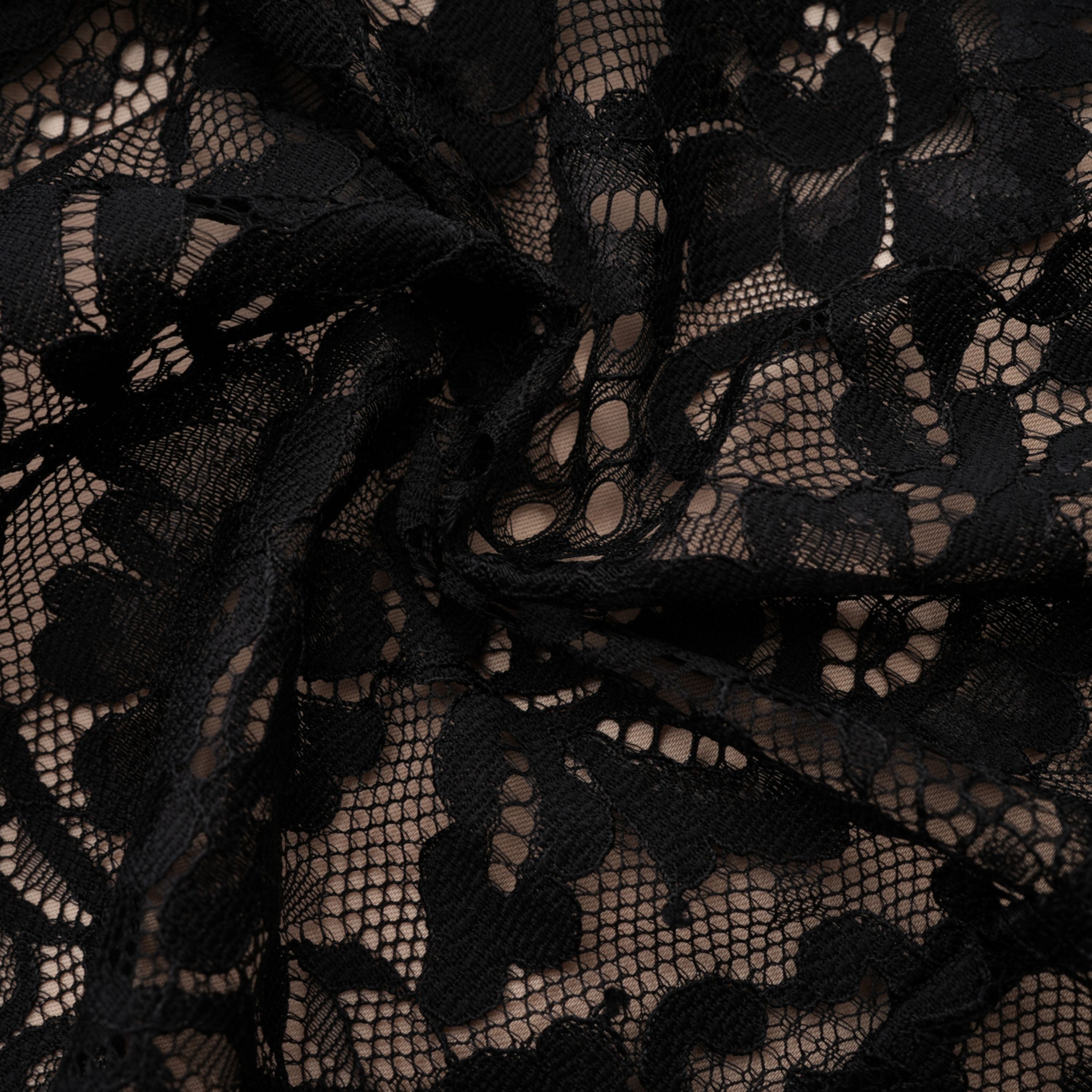 Mini-robe noire en dentelle à motifs floraux