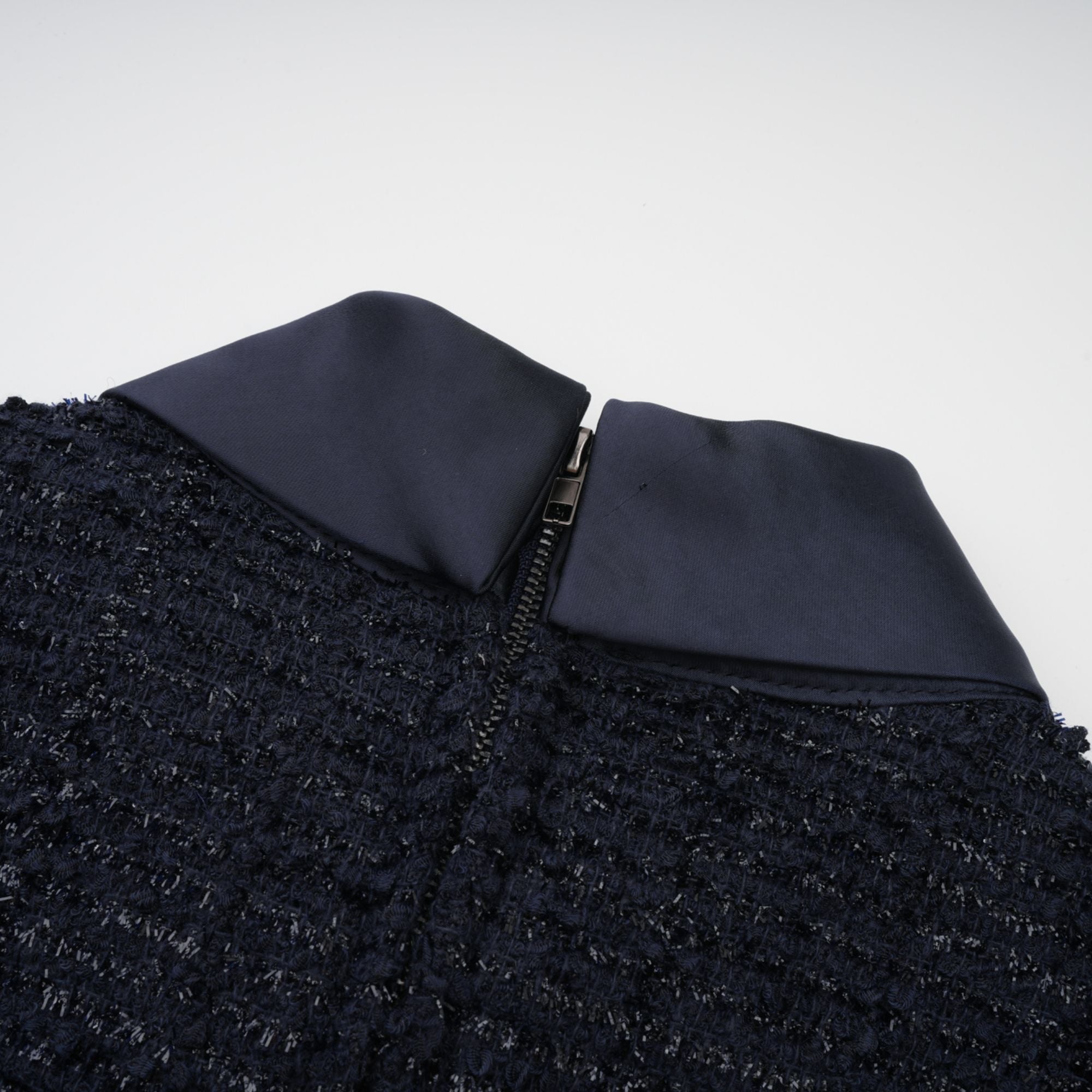Navy blue short-sleeve maxi dress with a peplum jacket bodice and satin skirt