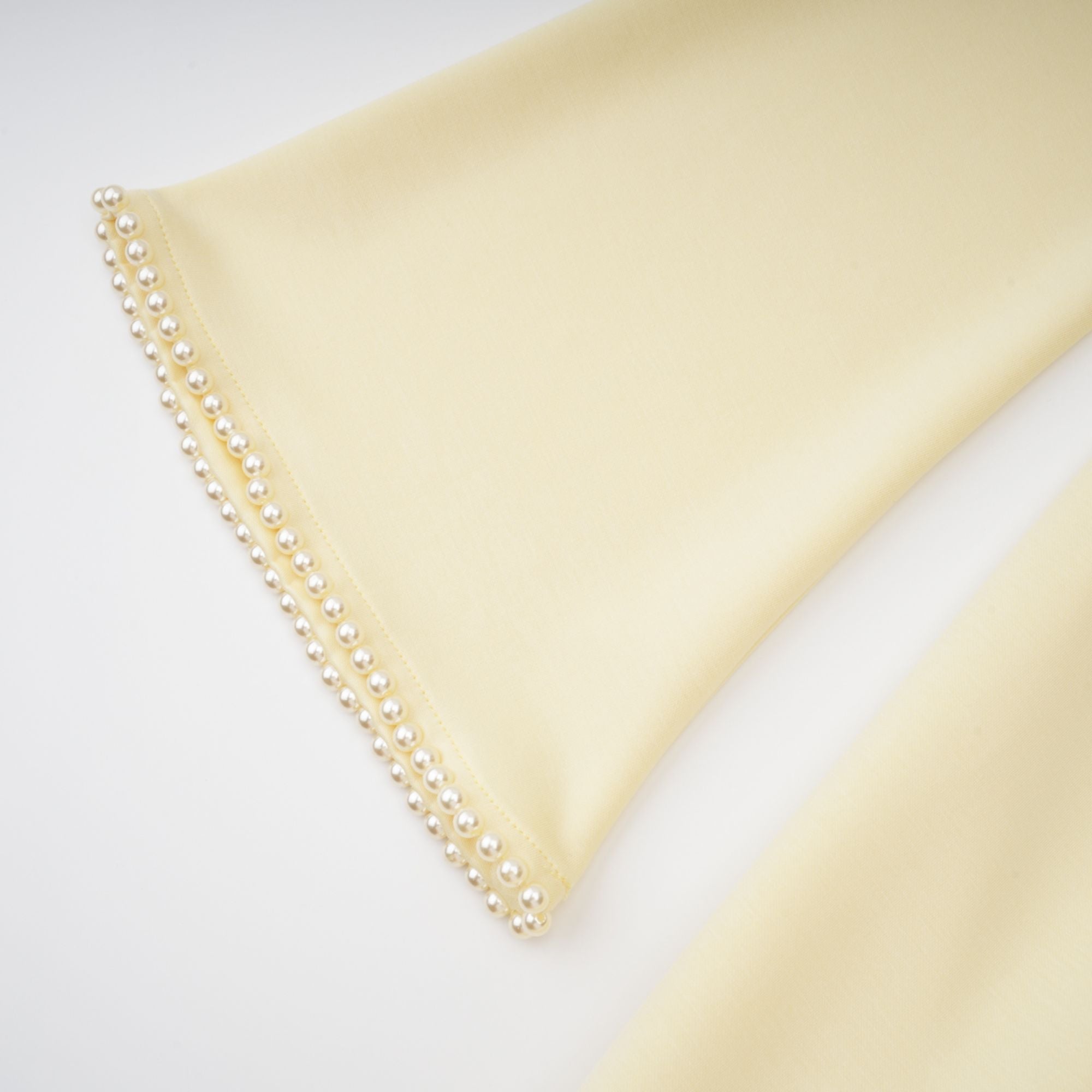 Light yellow long-sleeve maxi dress with a matching beaded cape overlay