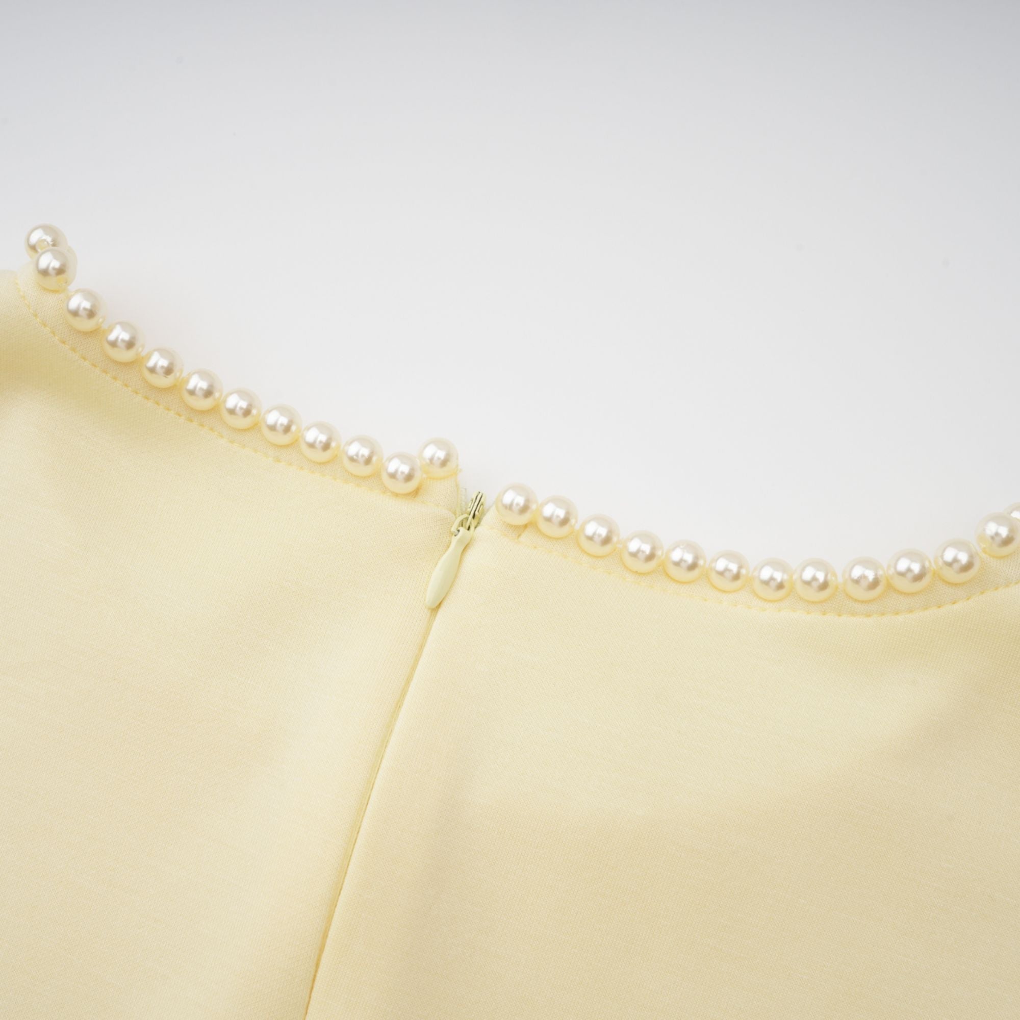 Light yellow long-sleeve maxi dress with a matching beaded cape overlay