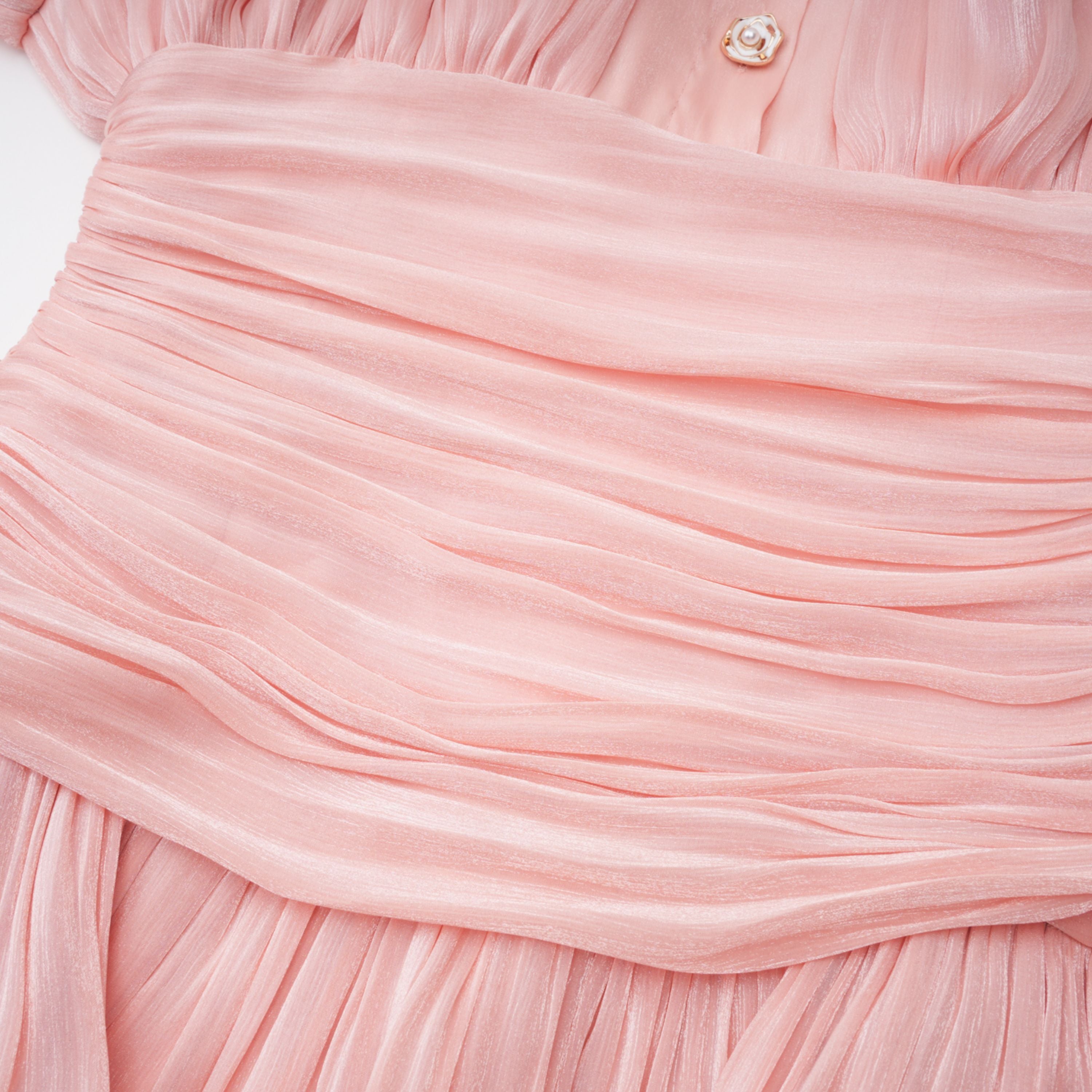 Mini-robe rose à col montant et volants