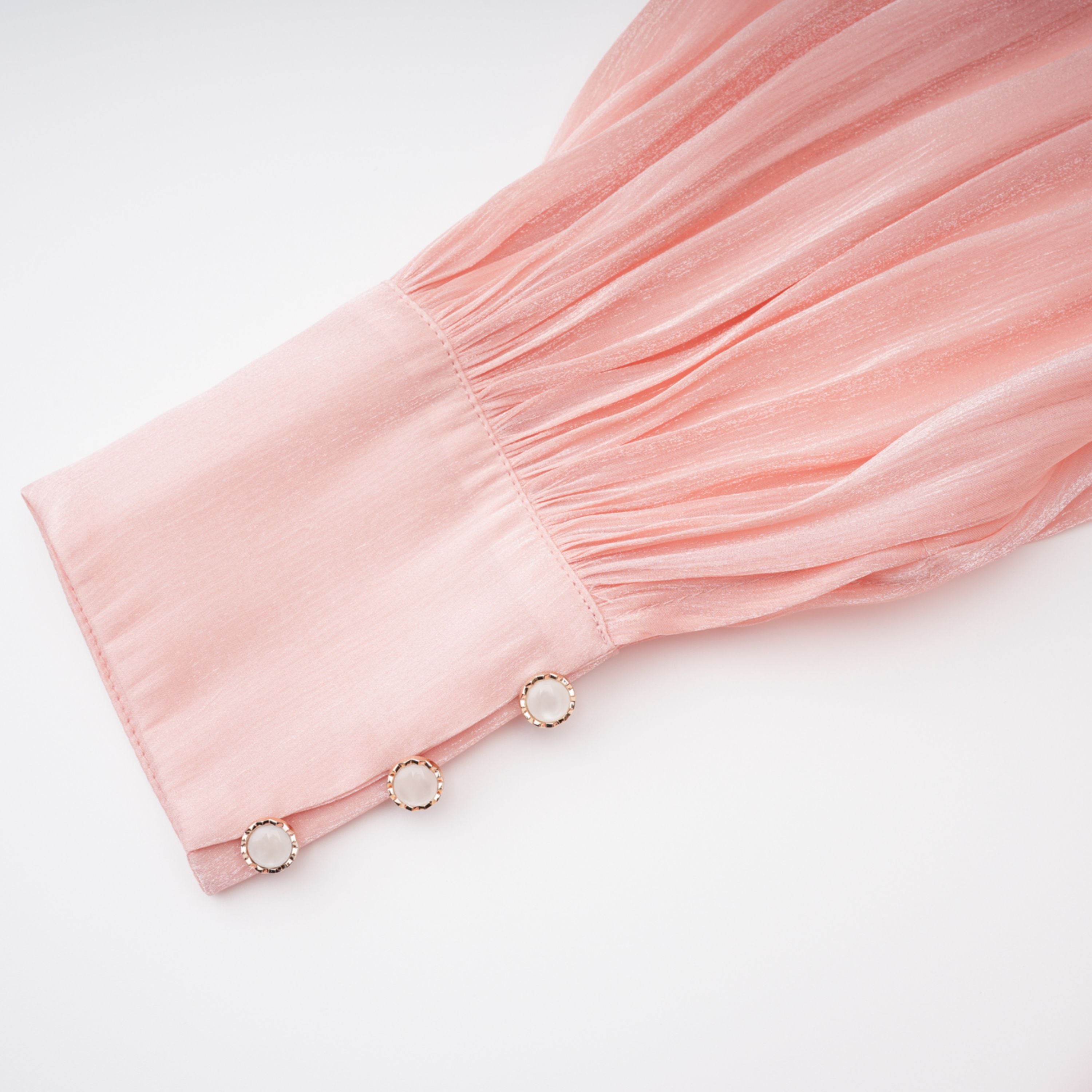 Mini-robe rose à col montant et volants