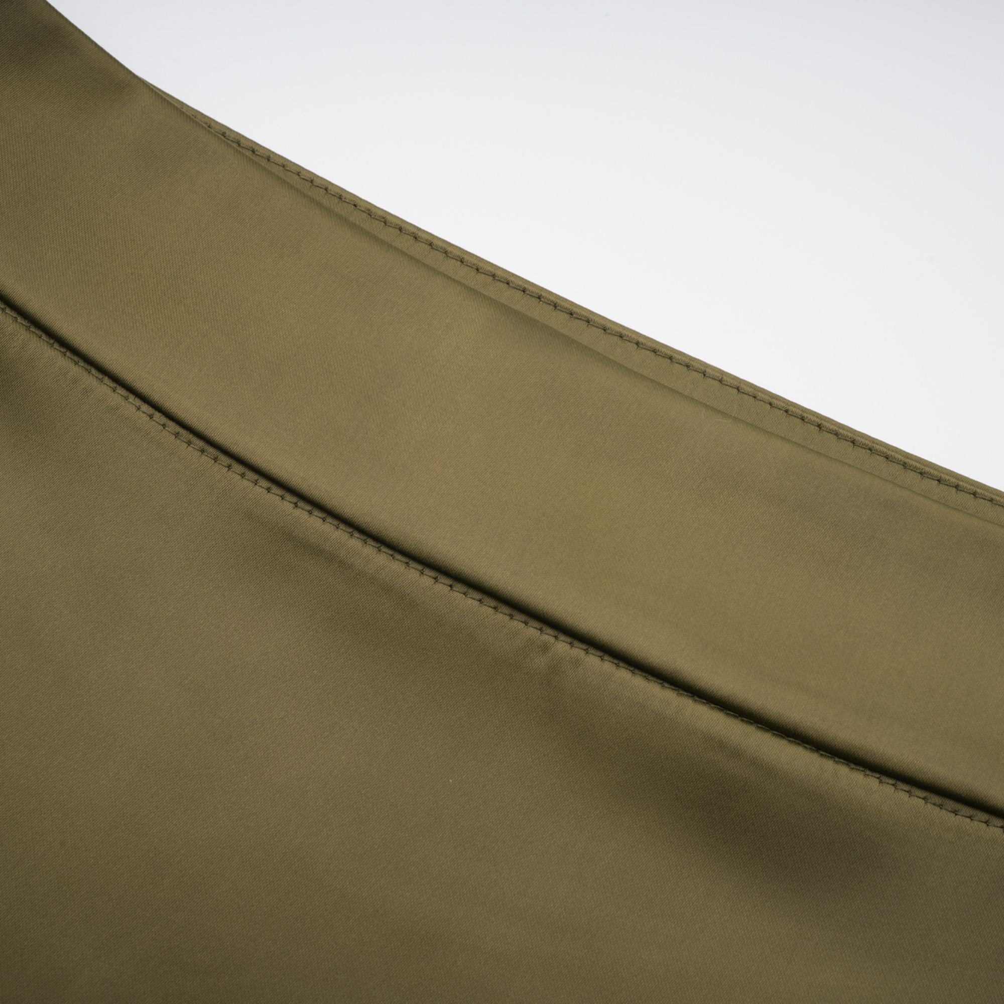 Olive green sleeveless maxi dress with a satin skirt