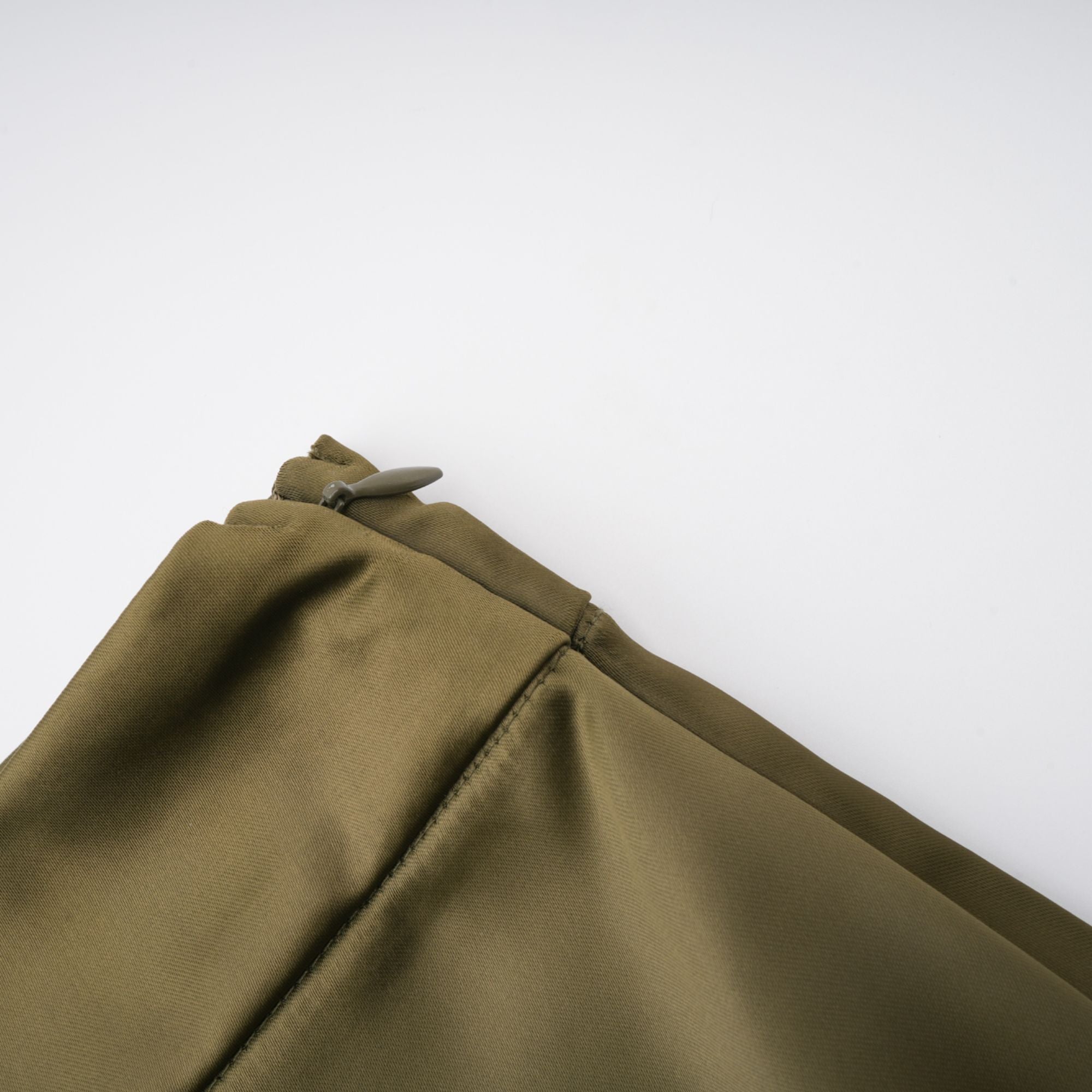 Olive green sleeveless maxi dress with a satin skirt