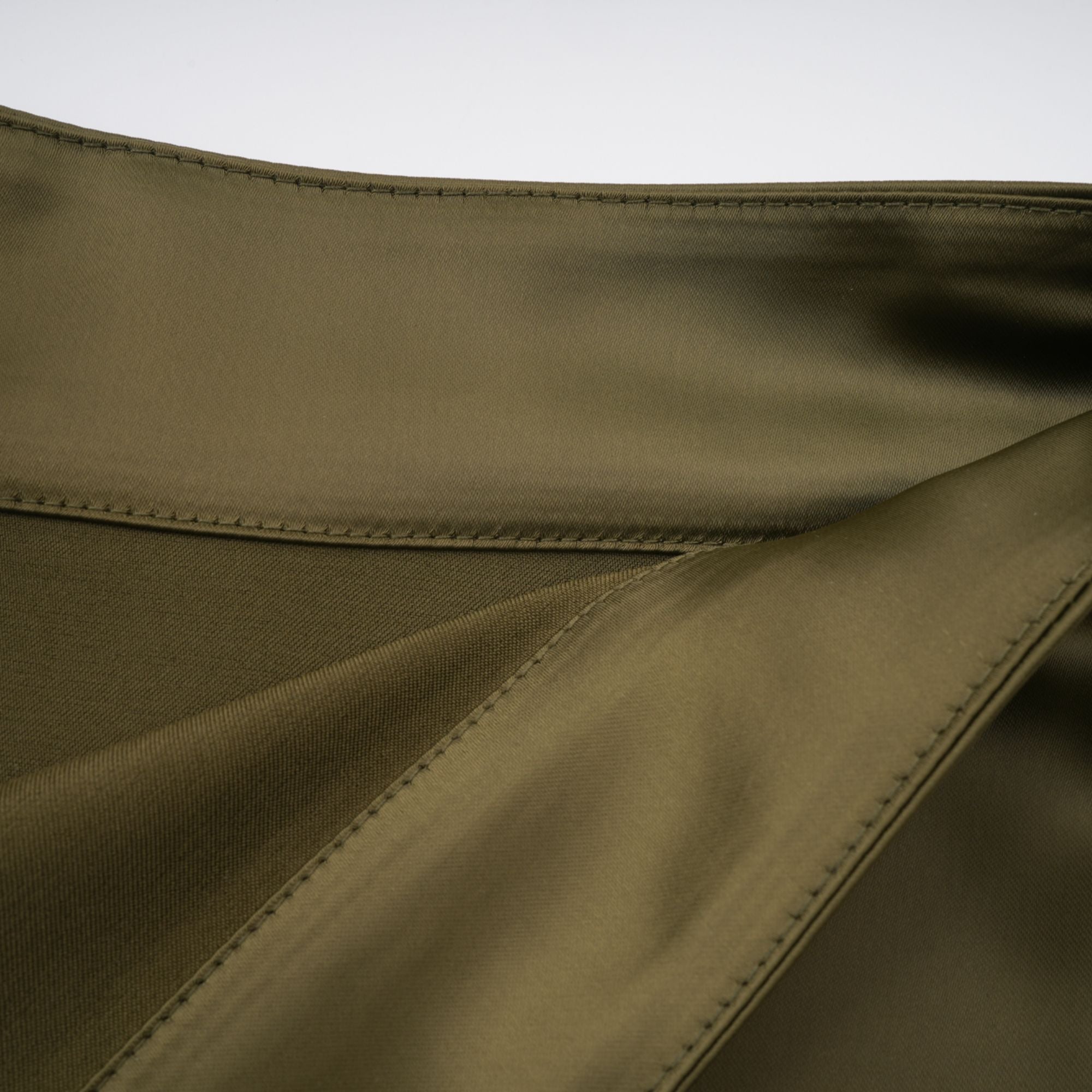 Olive green sleeveless maxi dress with a satin skirt