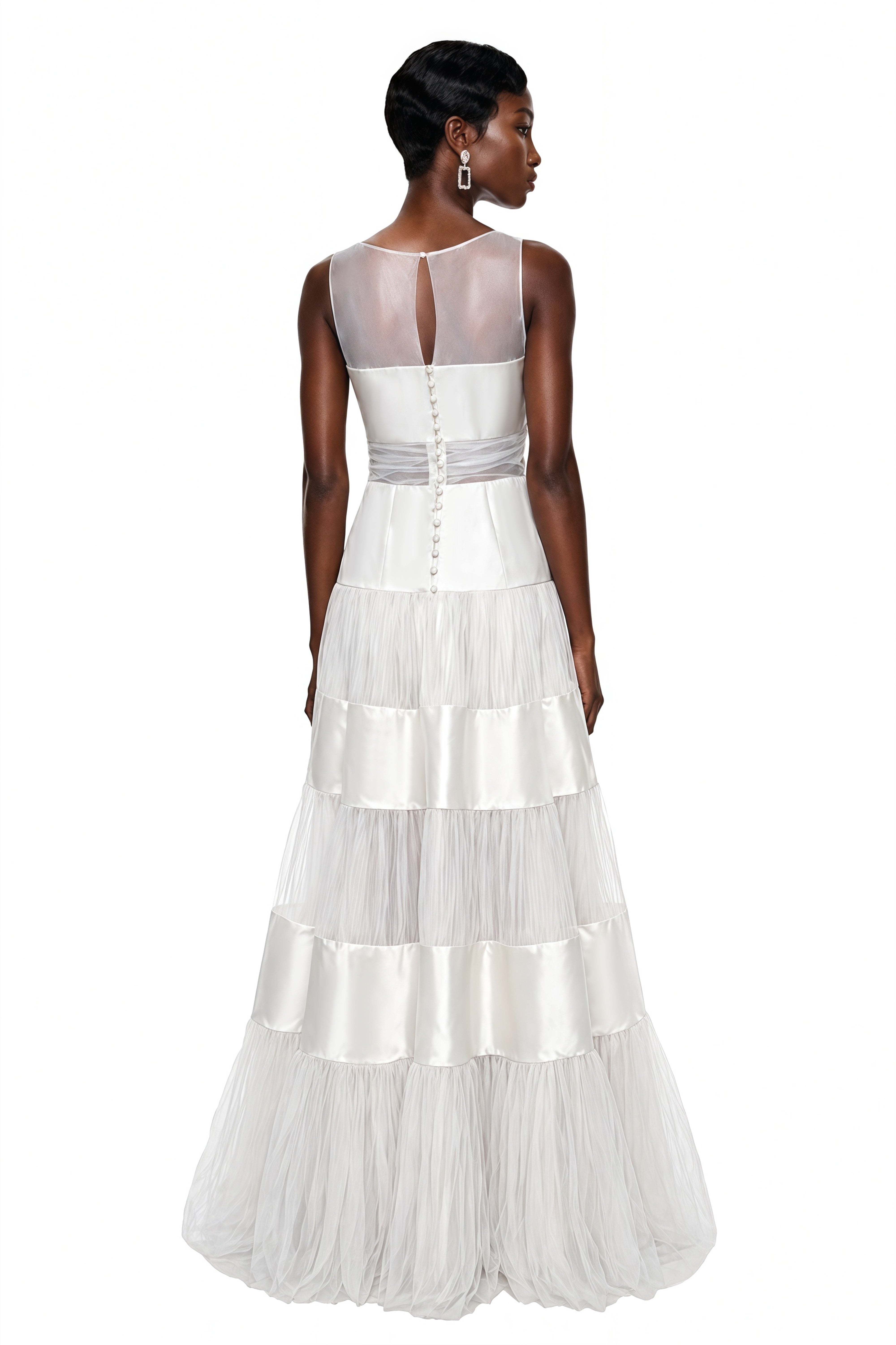 White tiered gown with alternating satin and pleated tulle bands