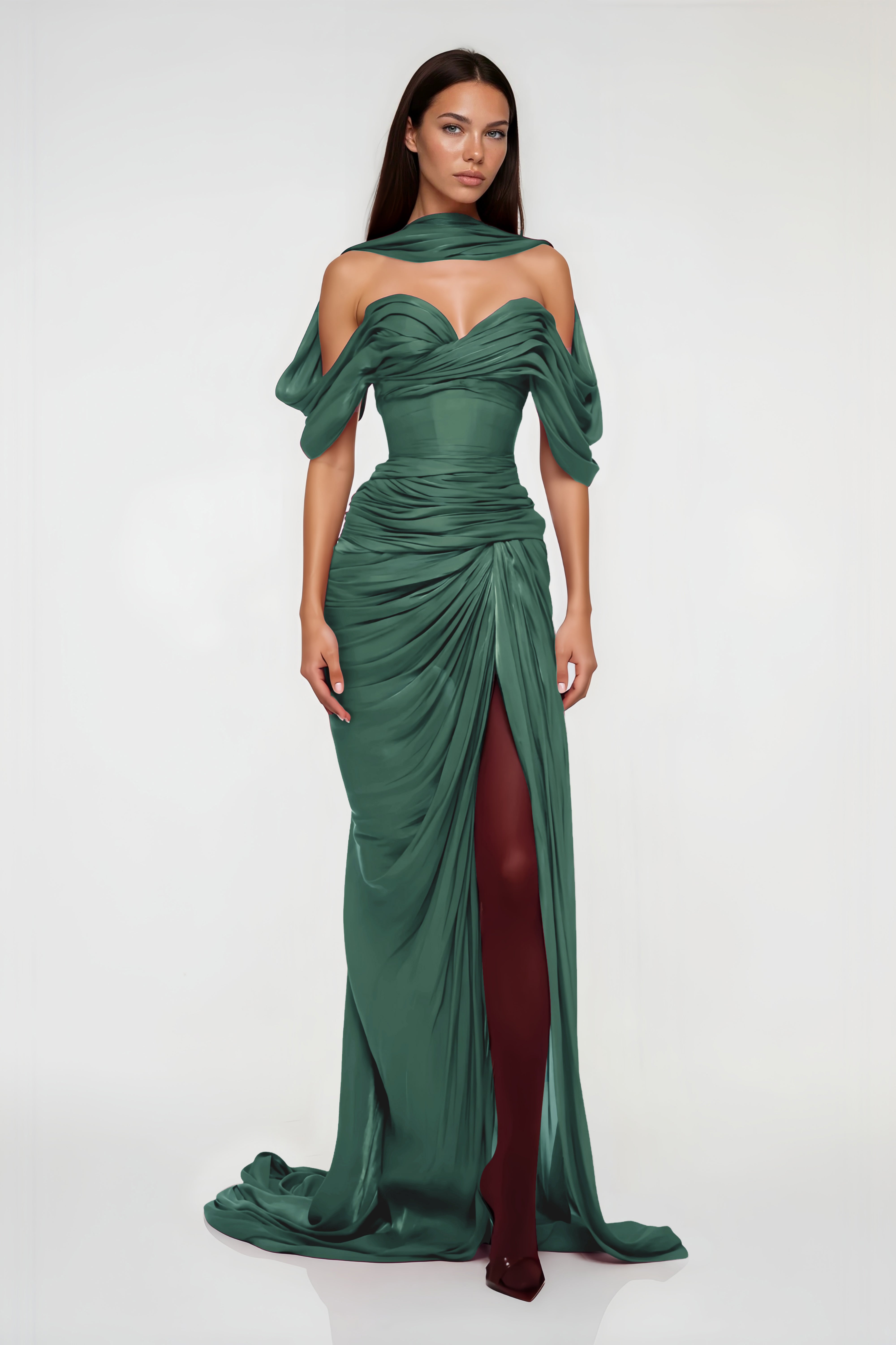 Emerald green maxi dress with an off-the-shoulder draped neckline, a matching neck scarf, and a ruched wrap skirt