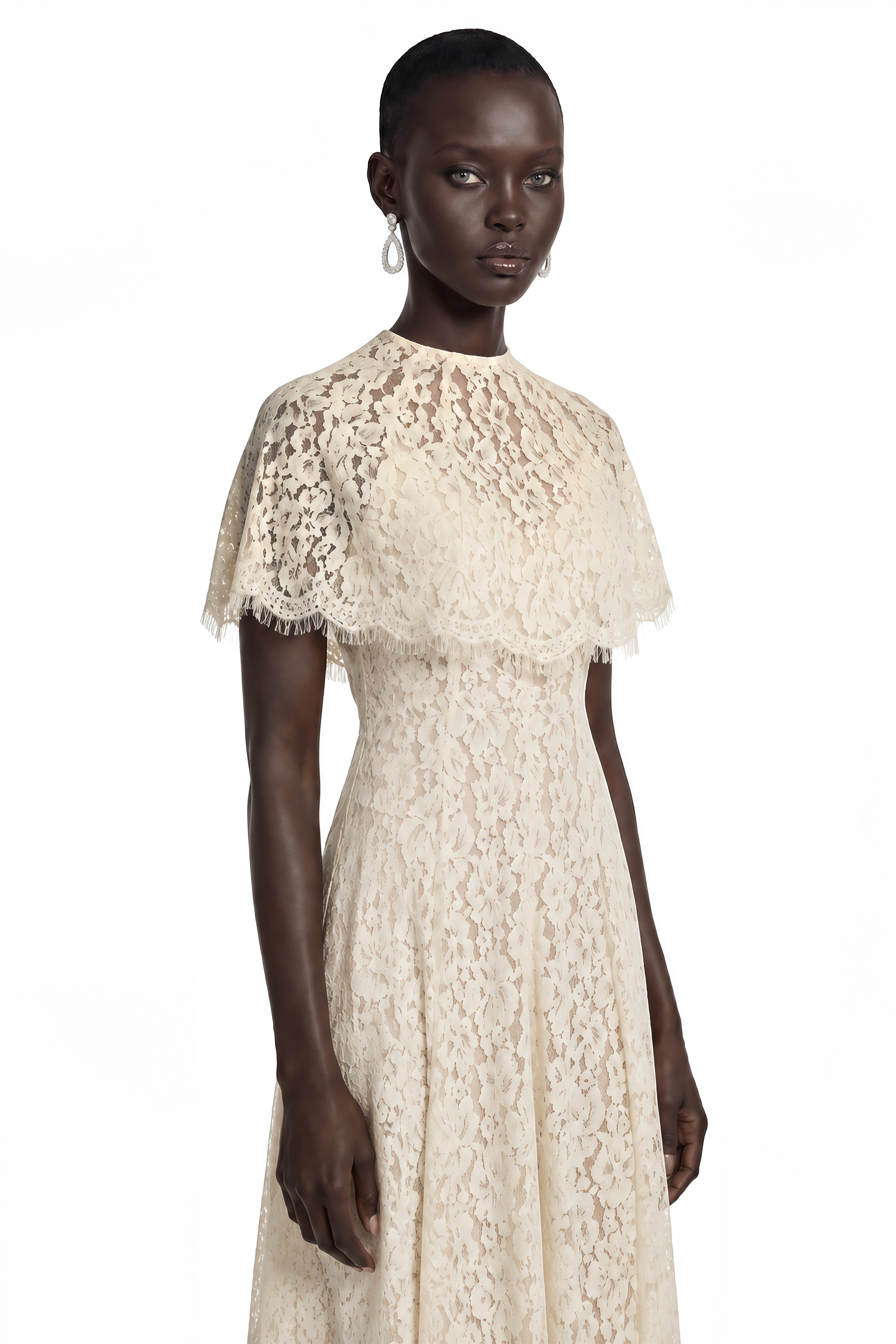 Cream lace high-neck maxi dress with a matching scalloped capelet overlay