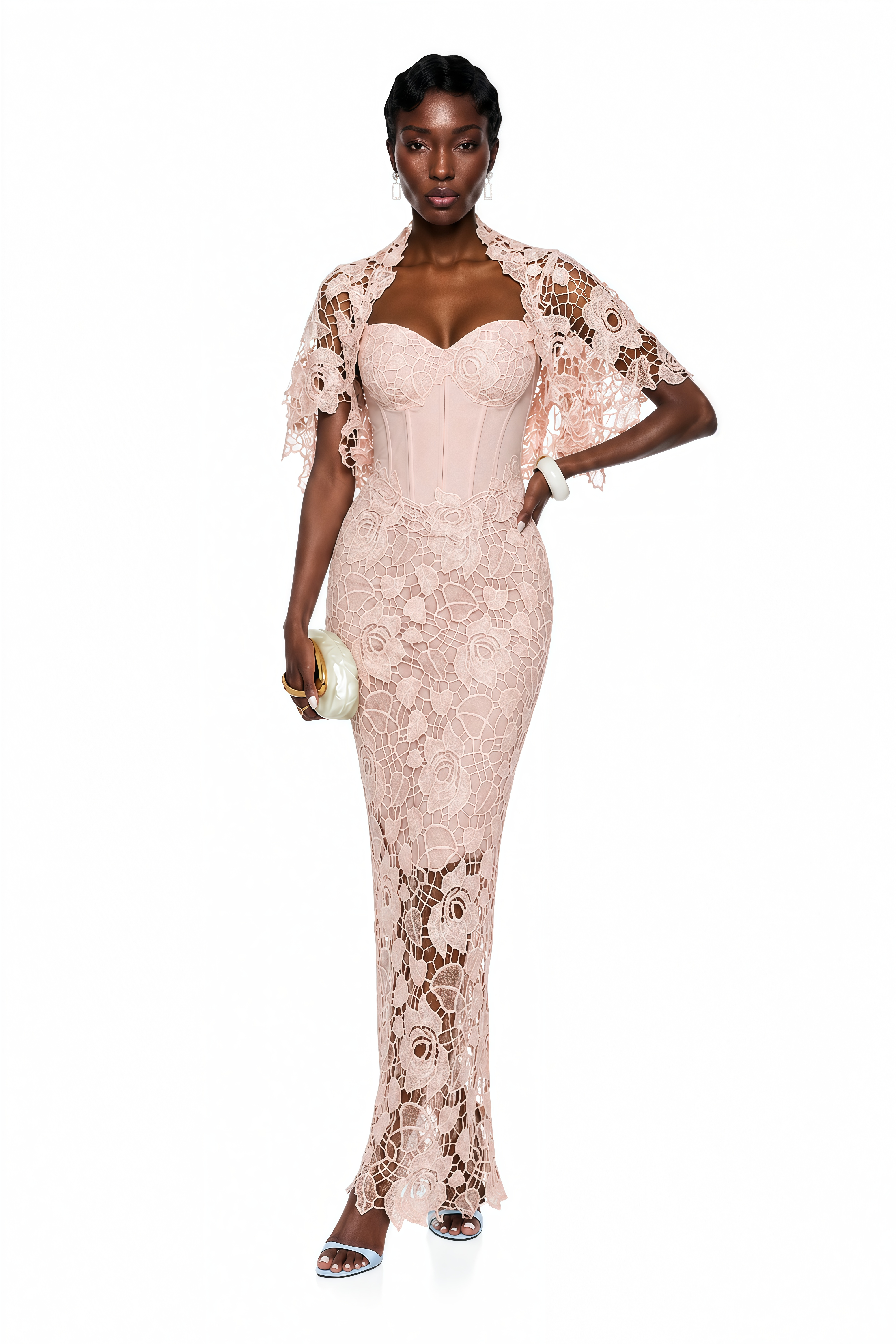 Blush pink lace maxi dress with a structured corset bodice, sweetheart neckline, and short cape overlay