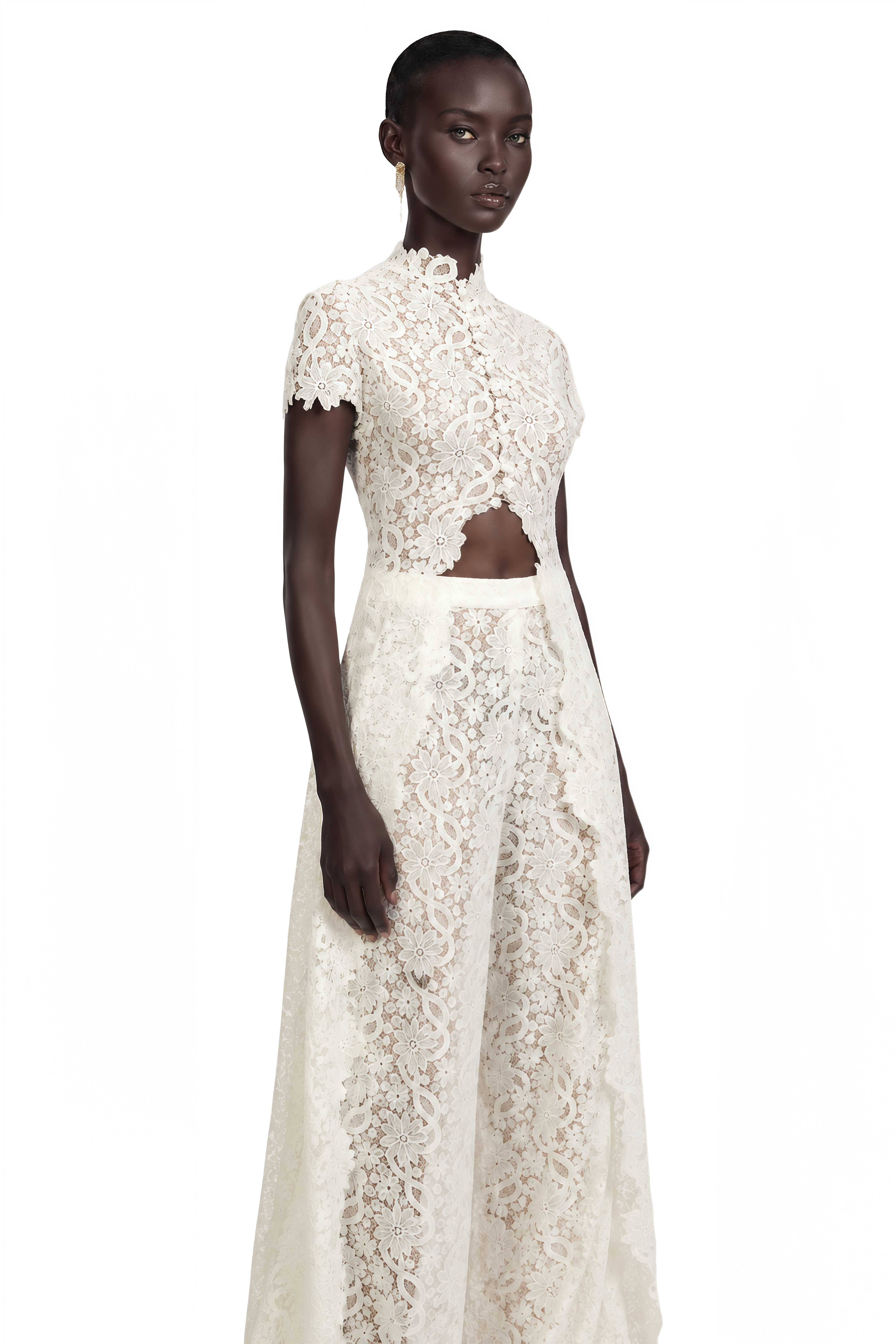 Black long-sleeve maxi dress with a sheer lace bodice and a draped skirt
