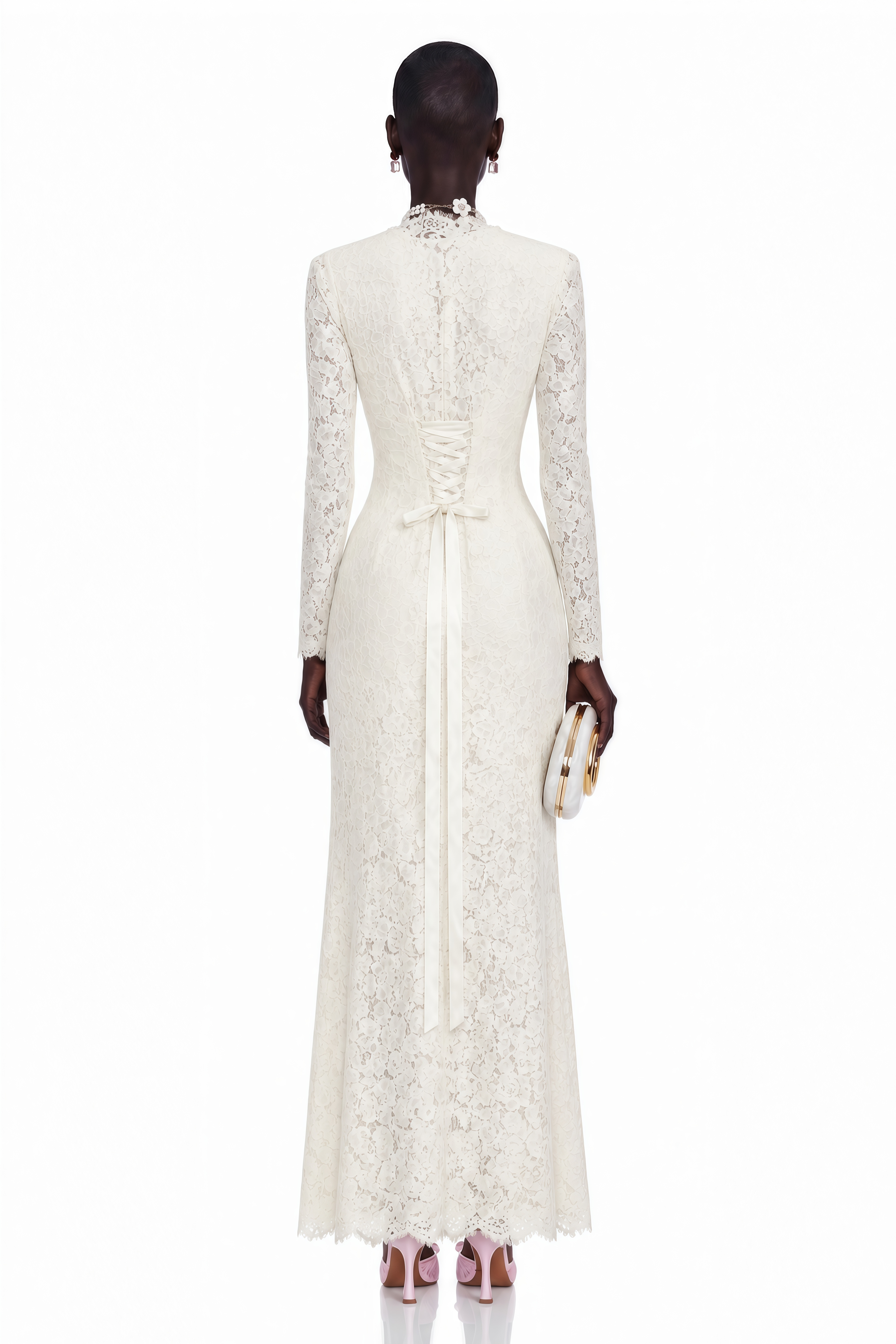 Cream long-sleeve lace gown with a high neck and structured bodice