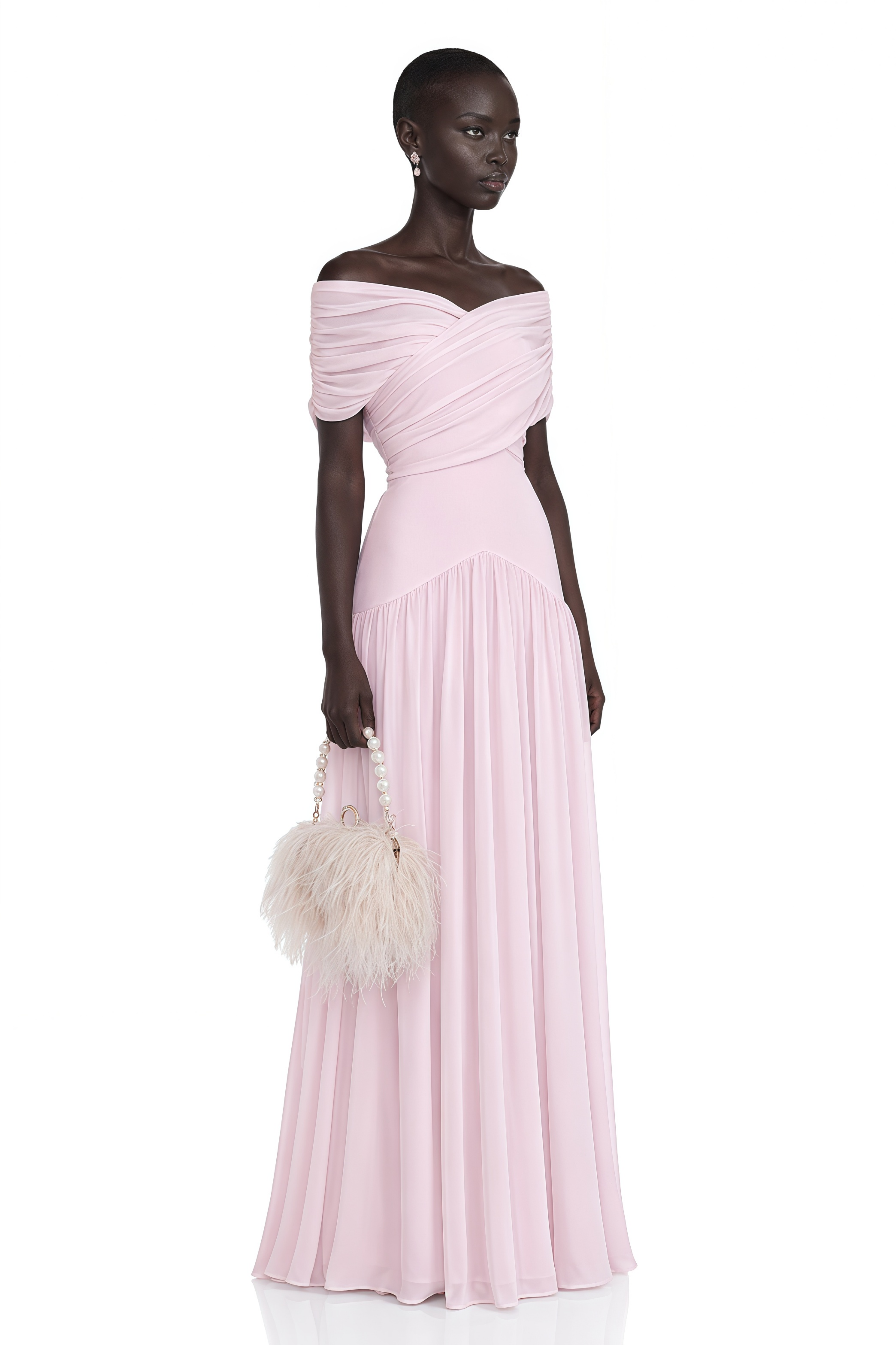 Light pink off-the-shoulder maxi dress with a criss-cross bodice and flowing skirt