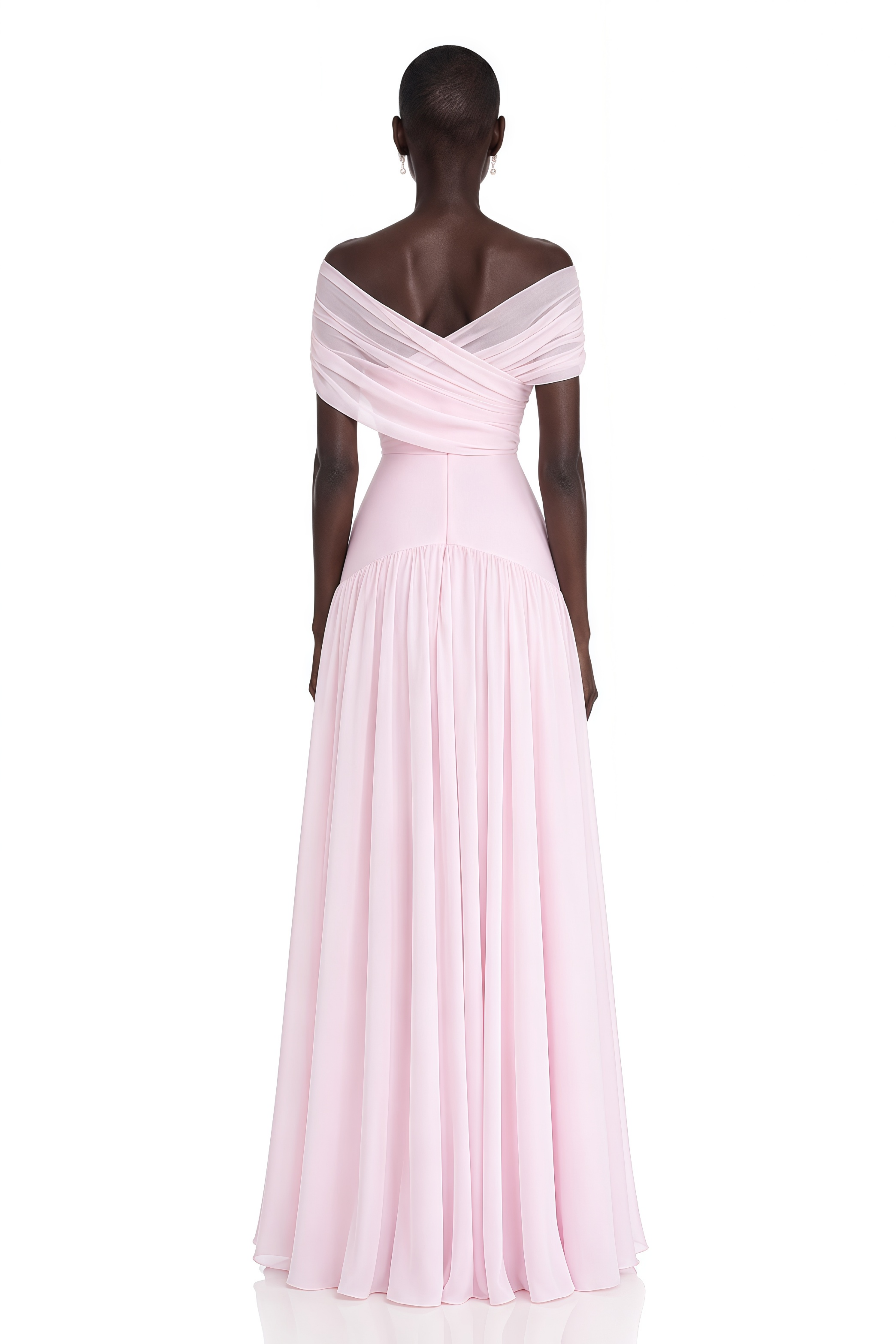 Light pink off-the-shoulder maxi dress with a criss-cross bodice and flowing skirt