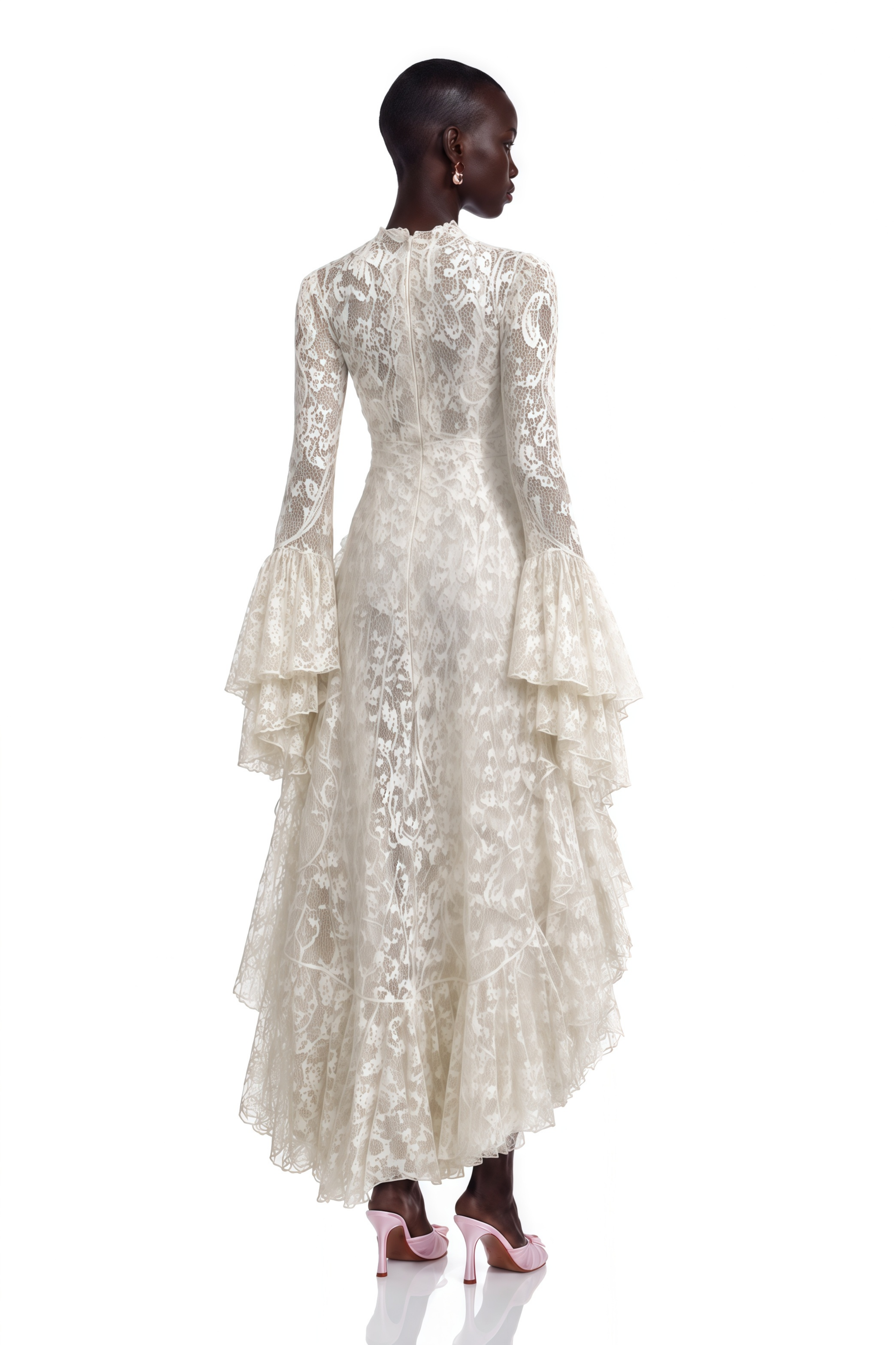 Cream lace high-low gown with a cutout bodice, high neck, and ruffled tiered skirt