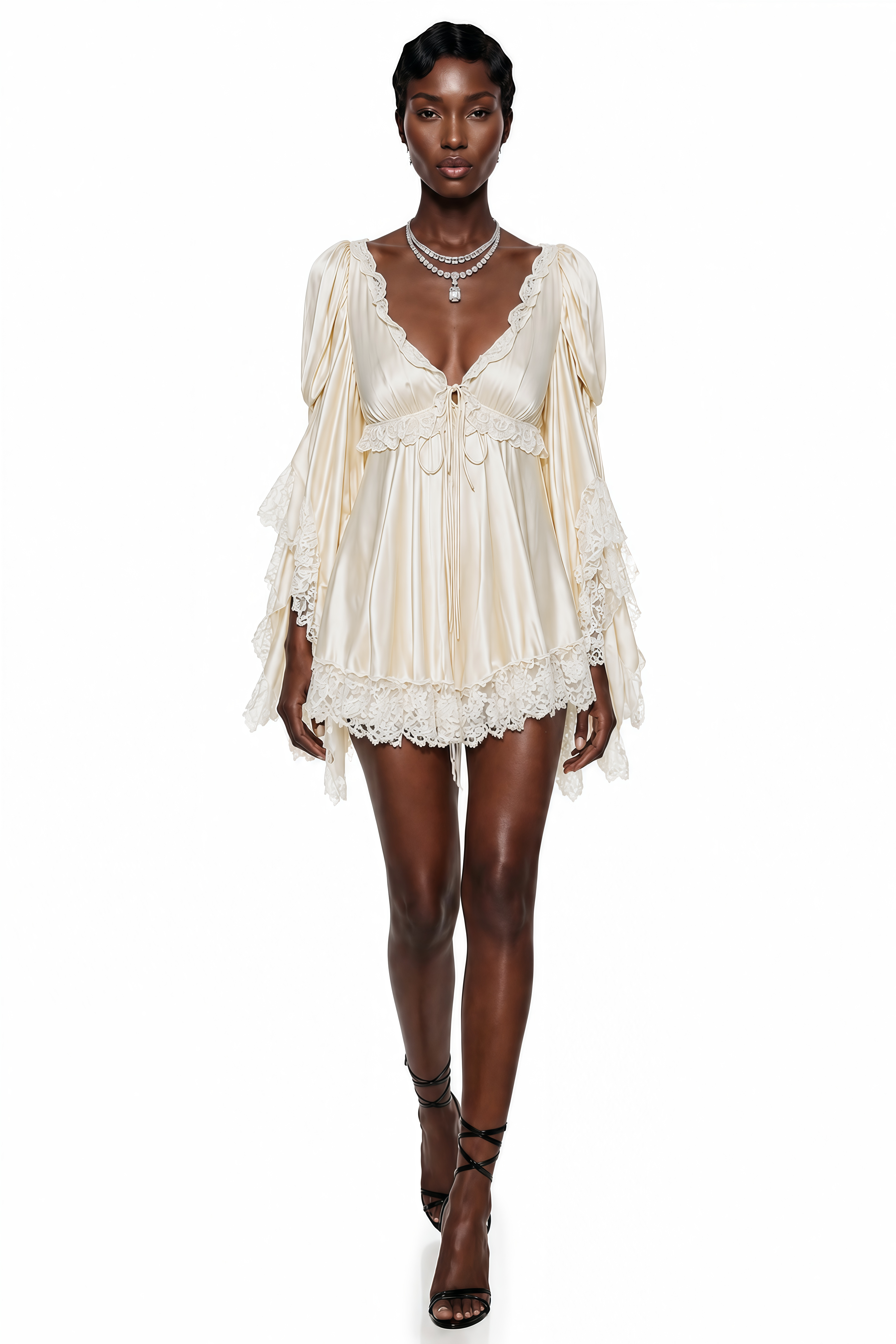 Cream satin v-neck mini dress with tiered lace-trimmed bell sleeves and a matching lace hem