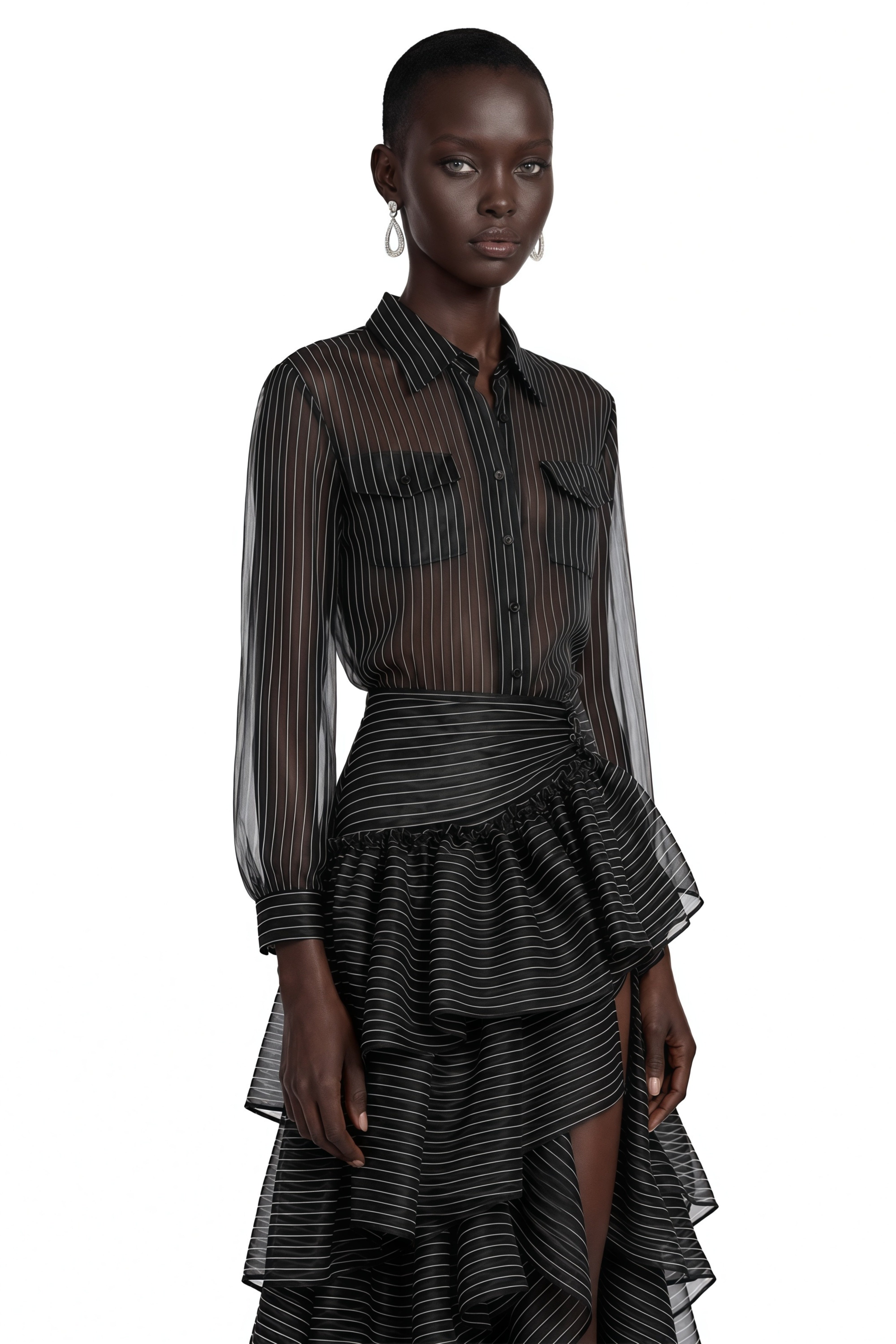 Black striped sheer maxi dress with a long-sleeve button-up top and a tiered ruffled skirt
