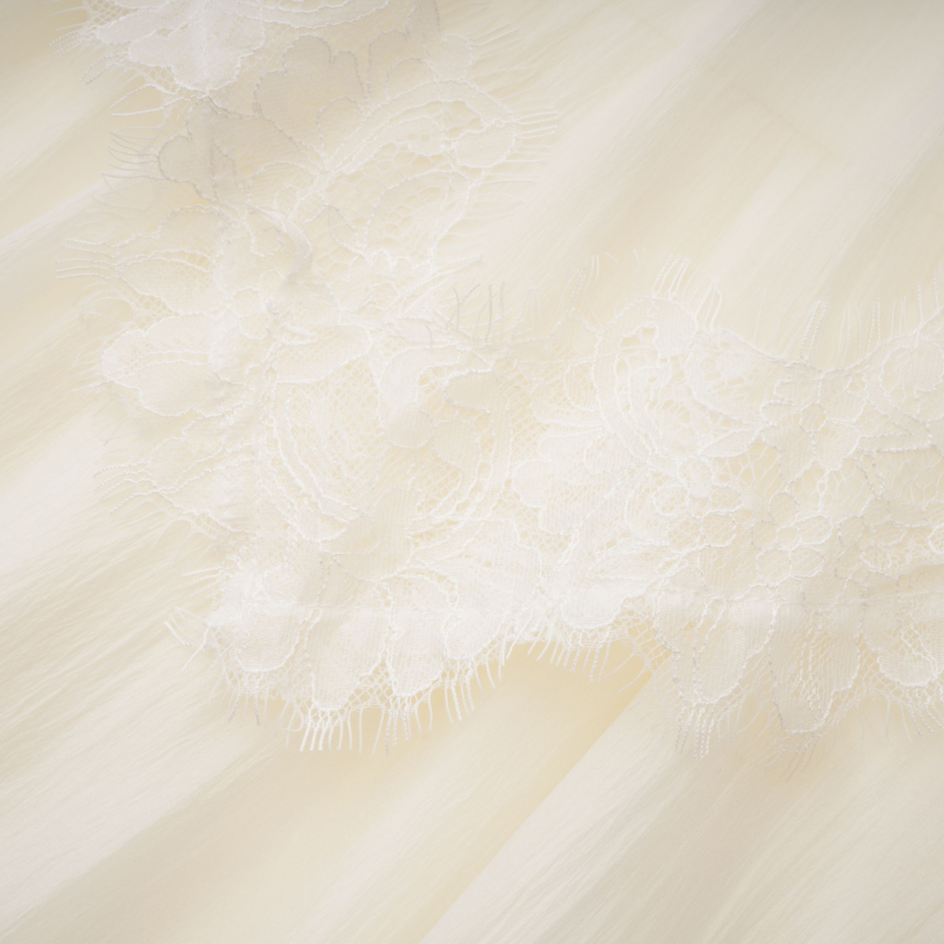 Beige tiered lace mini dress with spaghetti straps