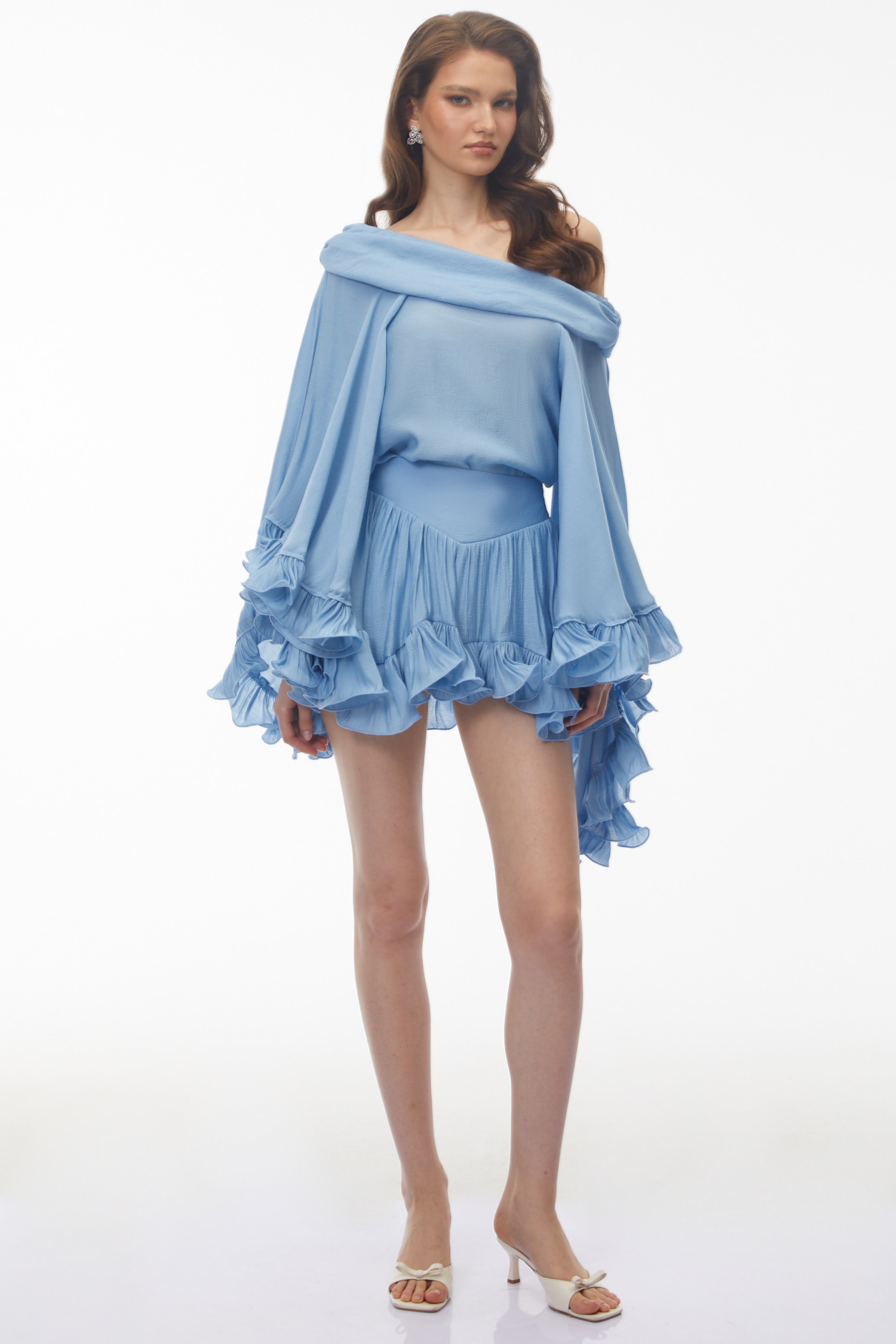 Periwinkle blue off-the-shoulder mini dress with tiered ruffle statement sleeves and hem