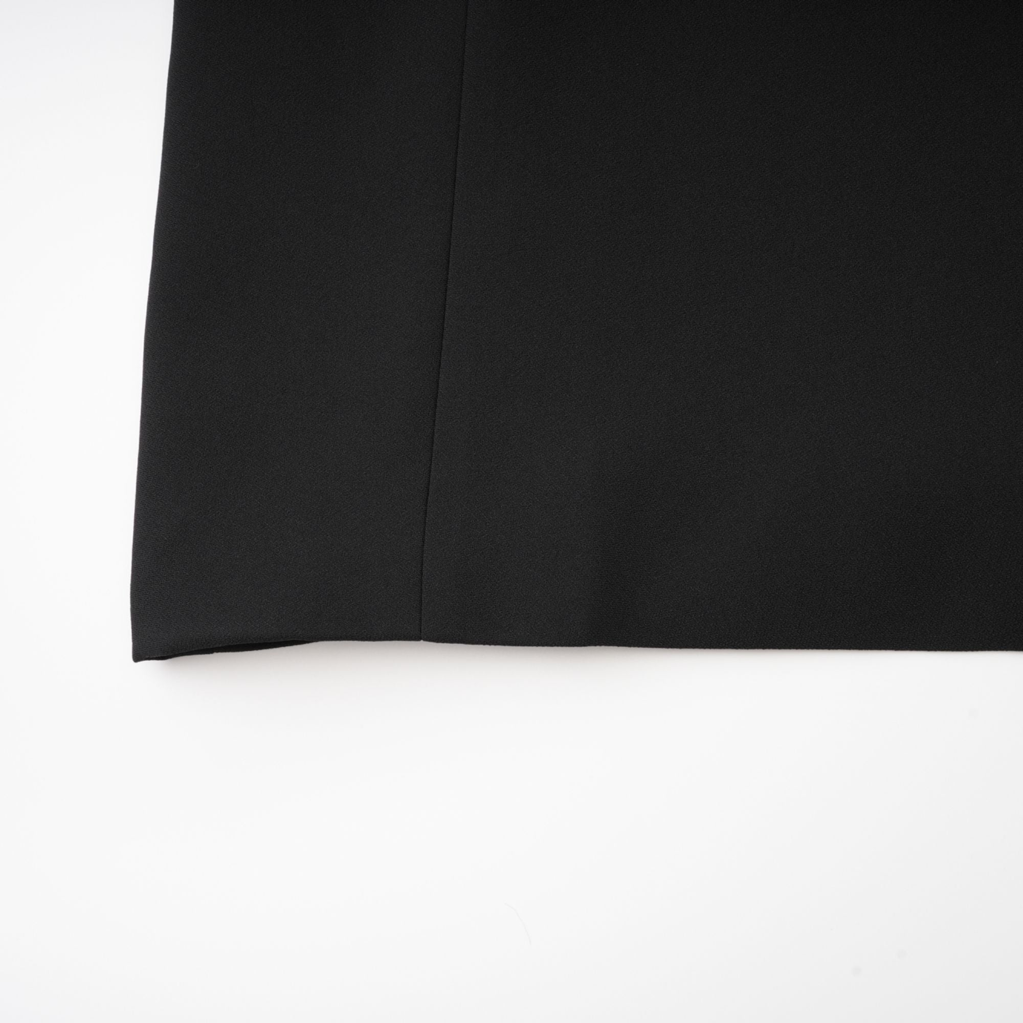 Magali black hourglass shoulder-padded mini dress