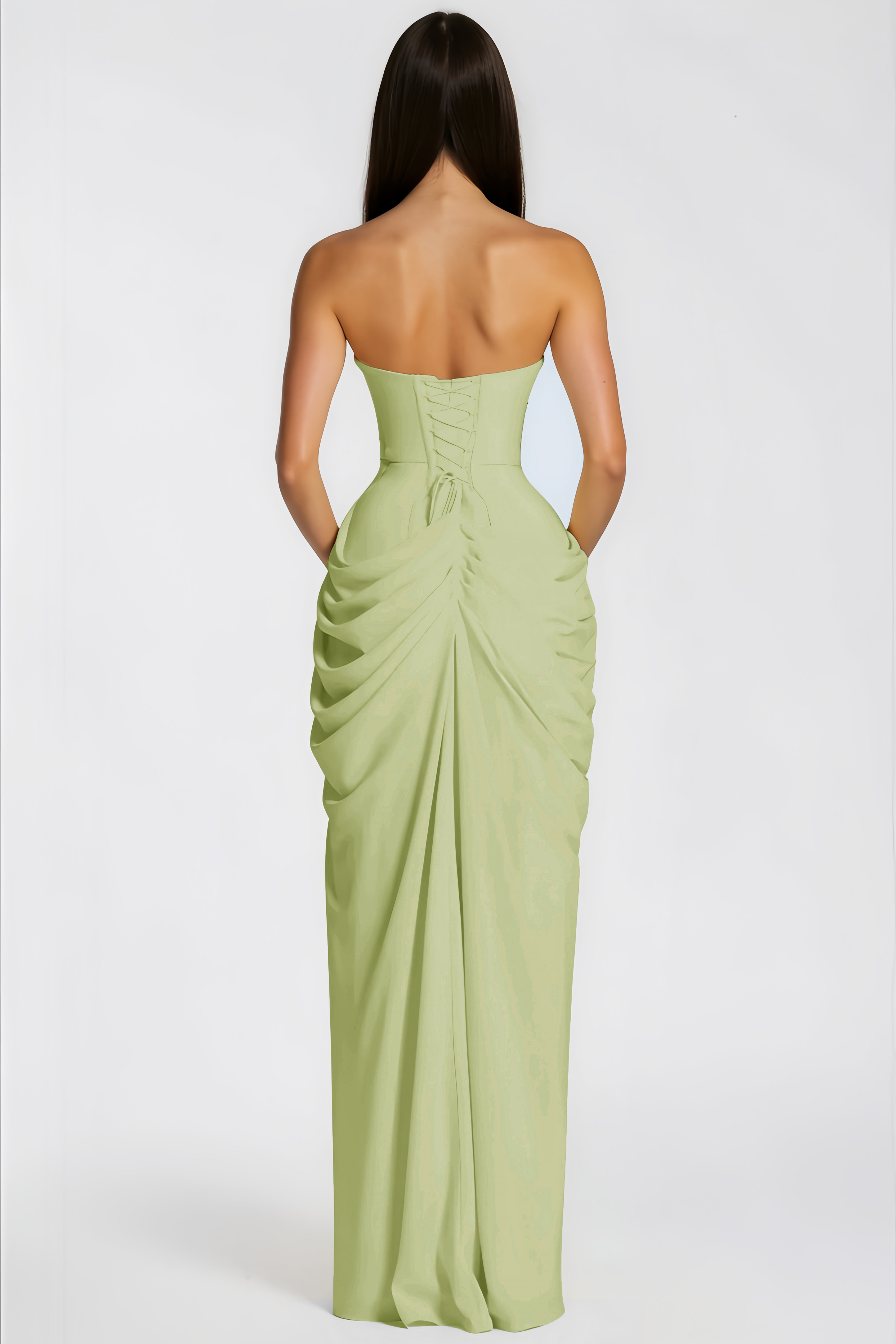 Sage green strapless maxi dress featuring a structured bodice and a draped wrap skirt with a high slit