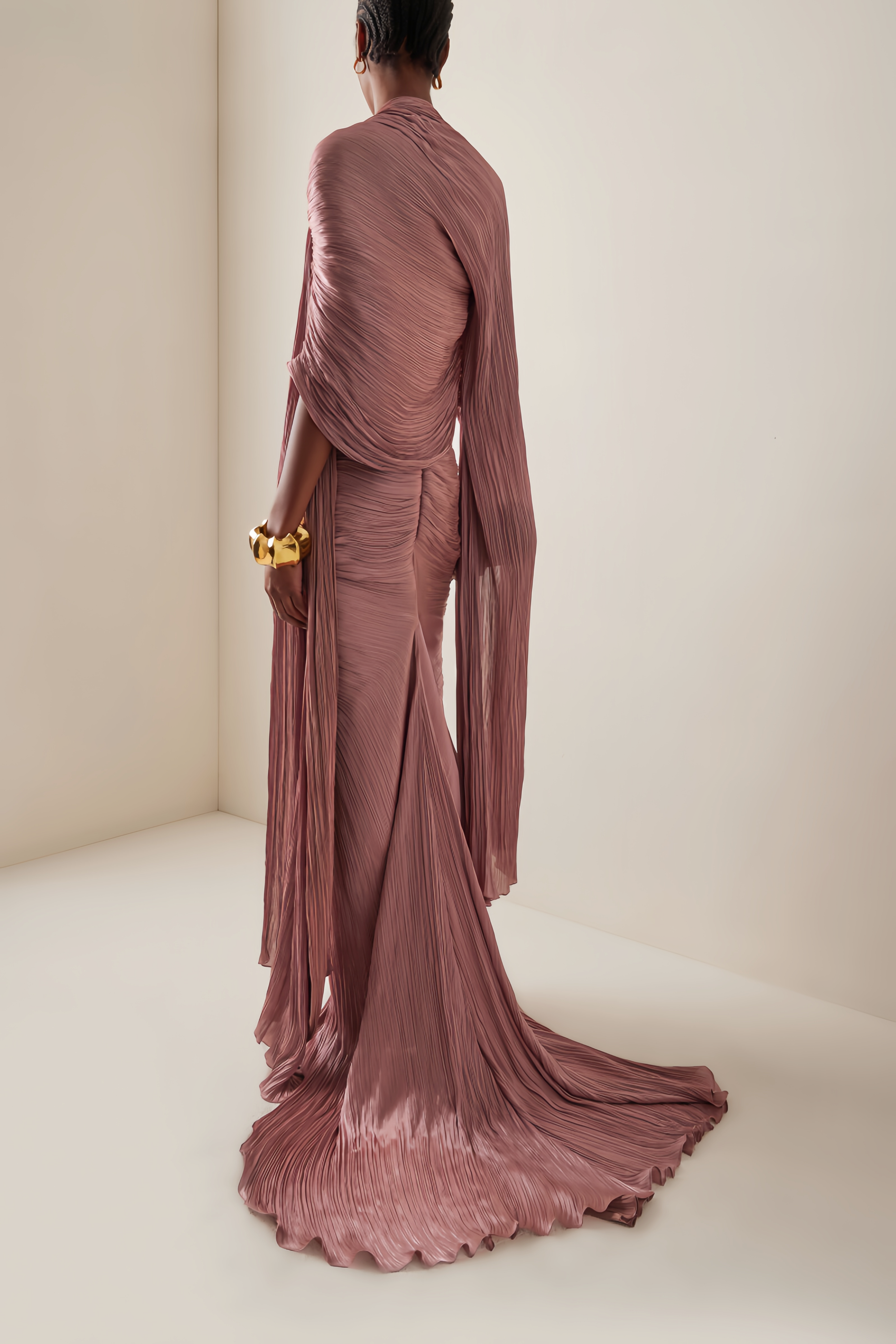 Mauve plissé strapless maxi dress with a front slit and matching floor-length cape