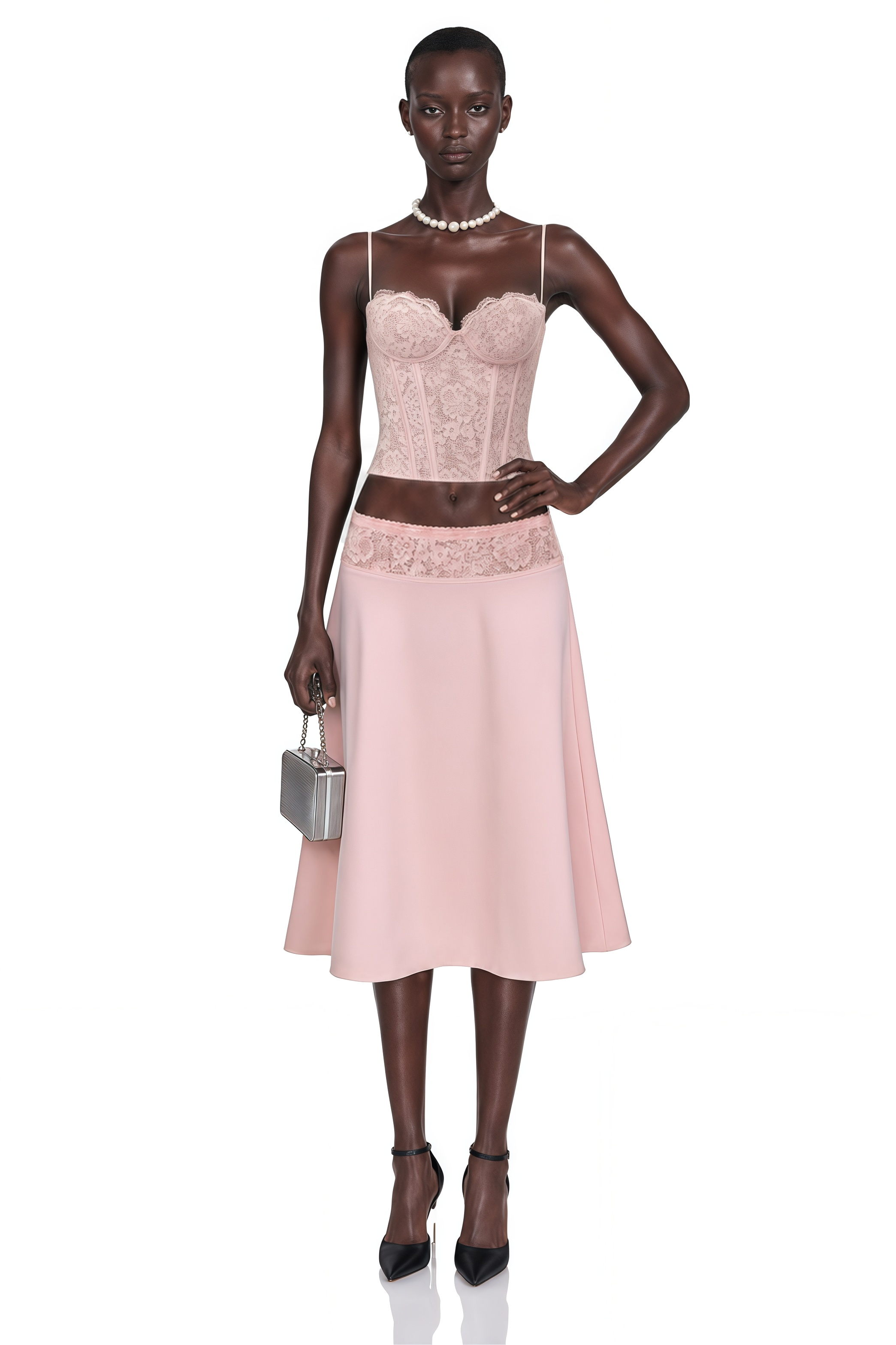 Pink lace corset top paired with an A-line midi skirt