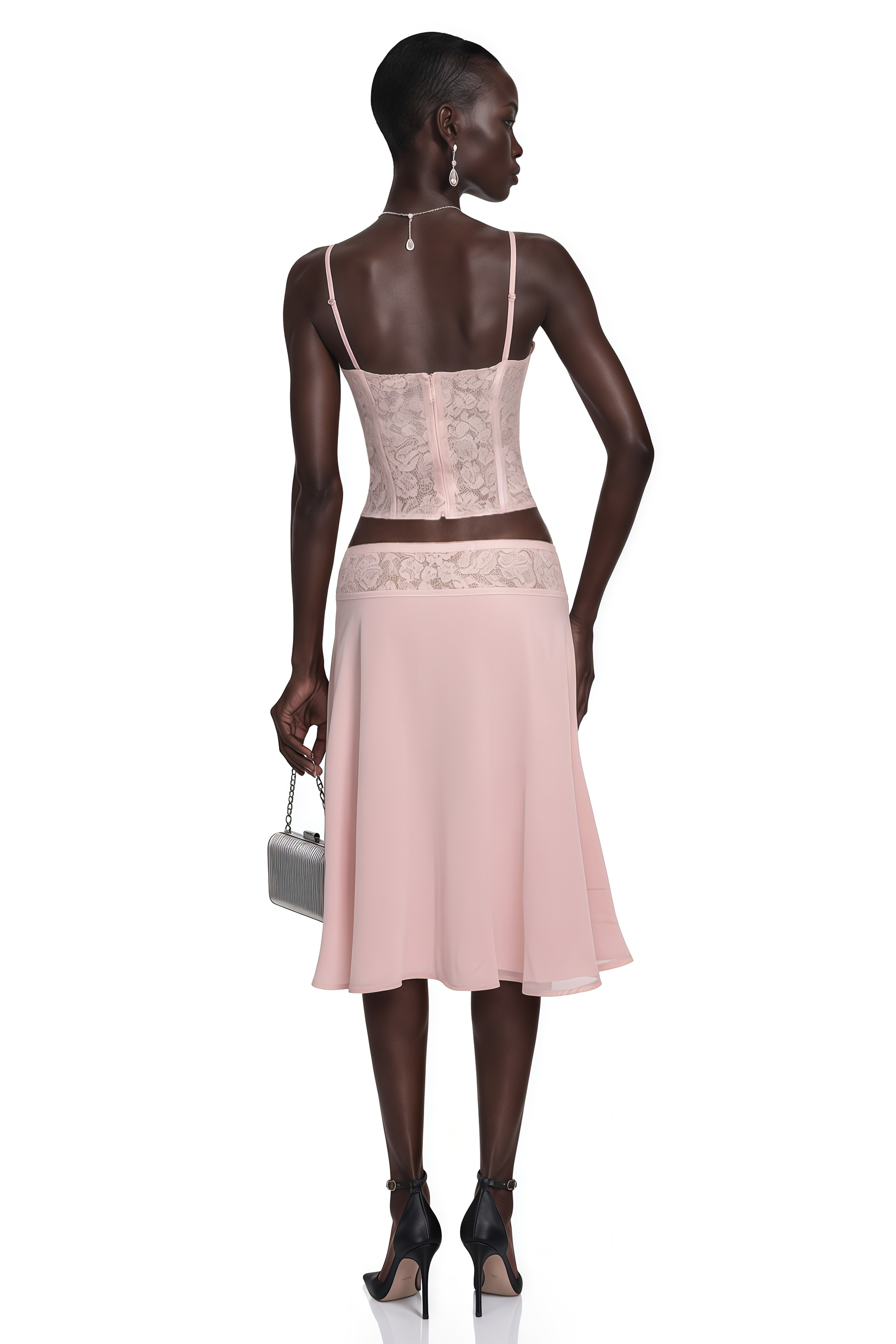 Pink lace corset top paired with an A-line midi skirt