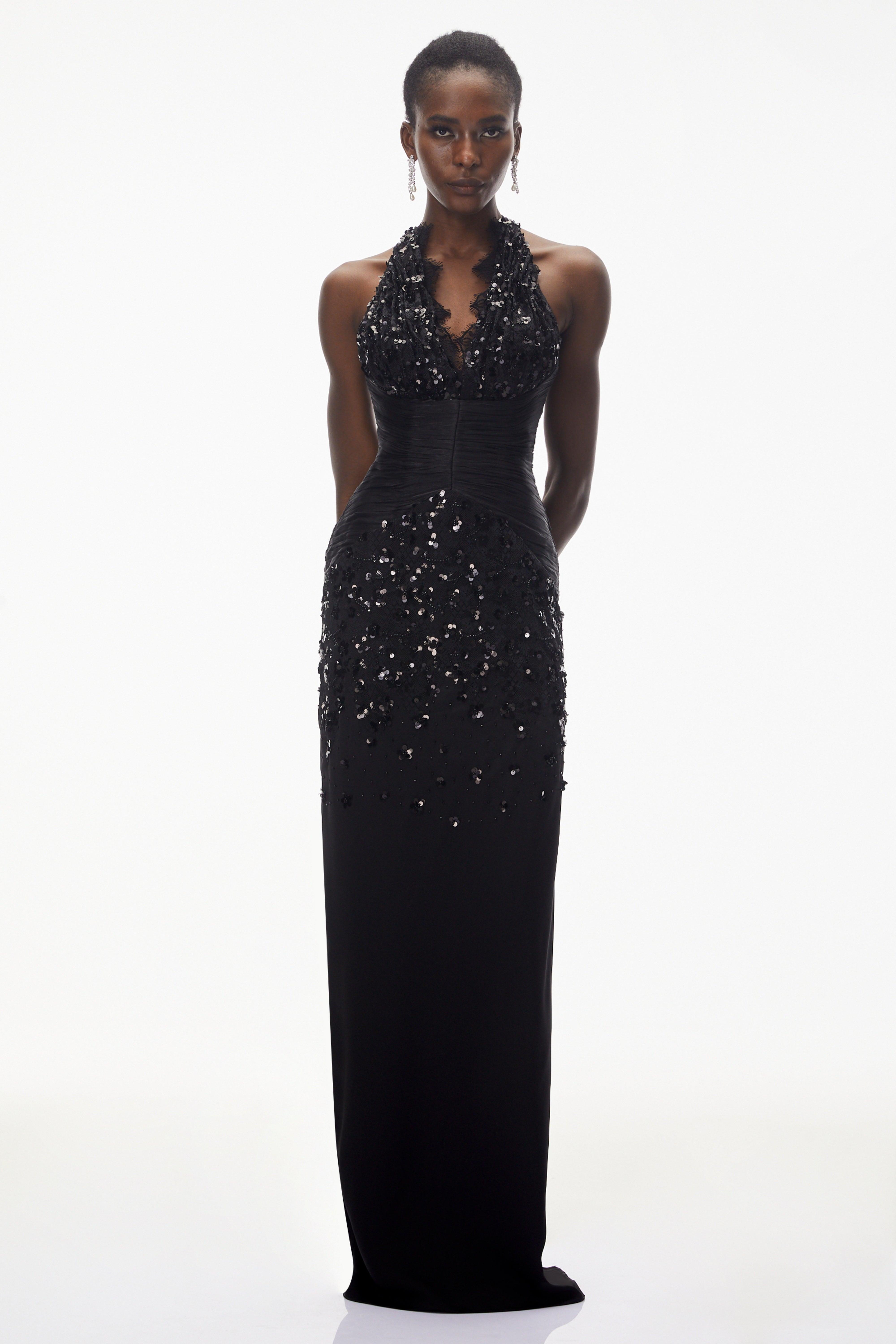 Black sequined halter gown with lace trim