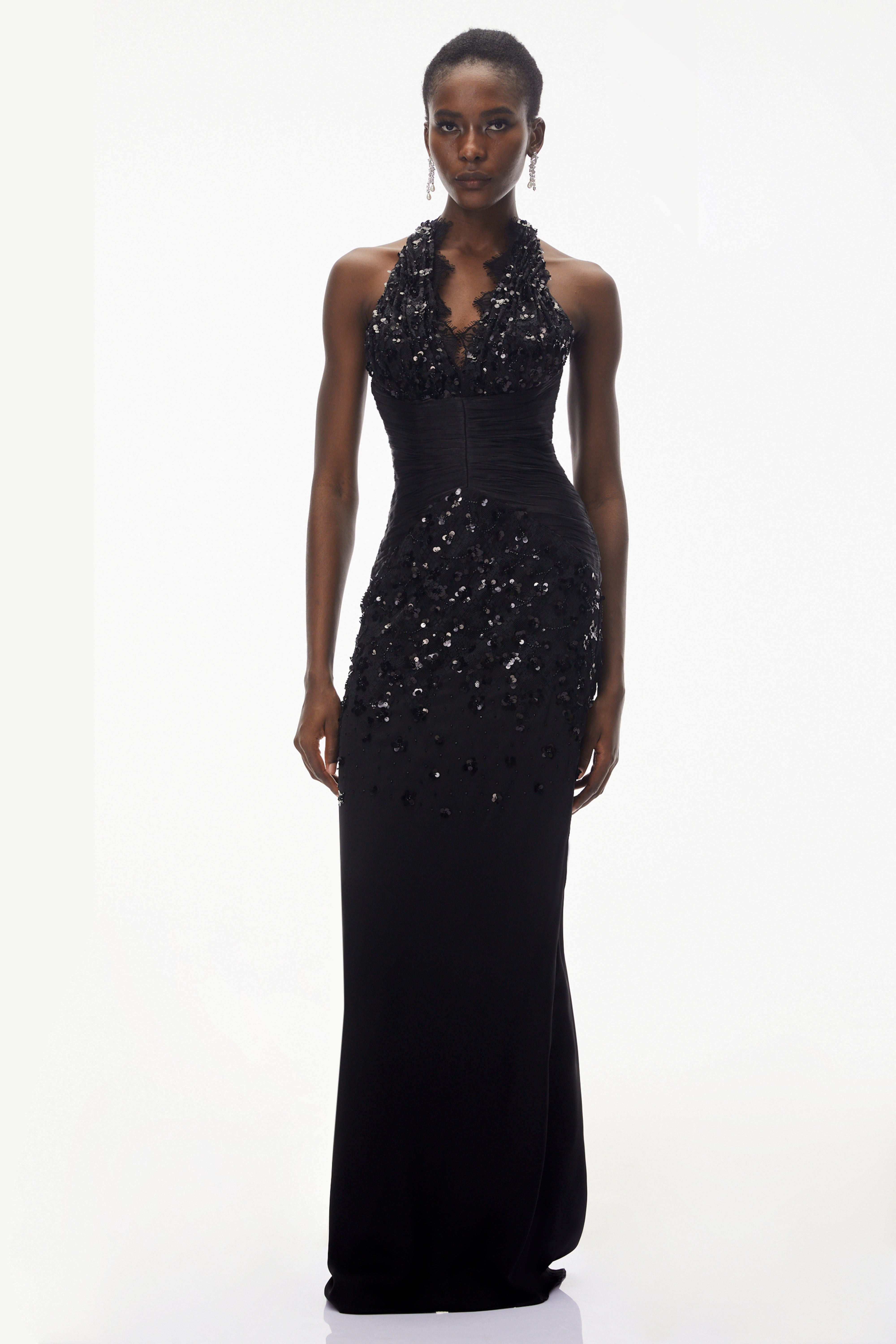 Black sequined halter gown with lace trim