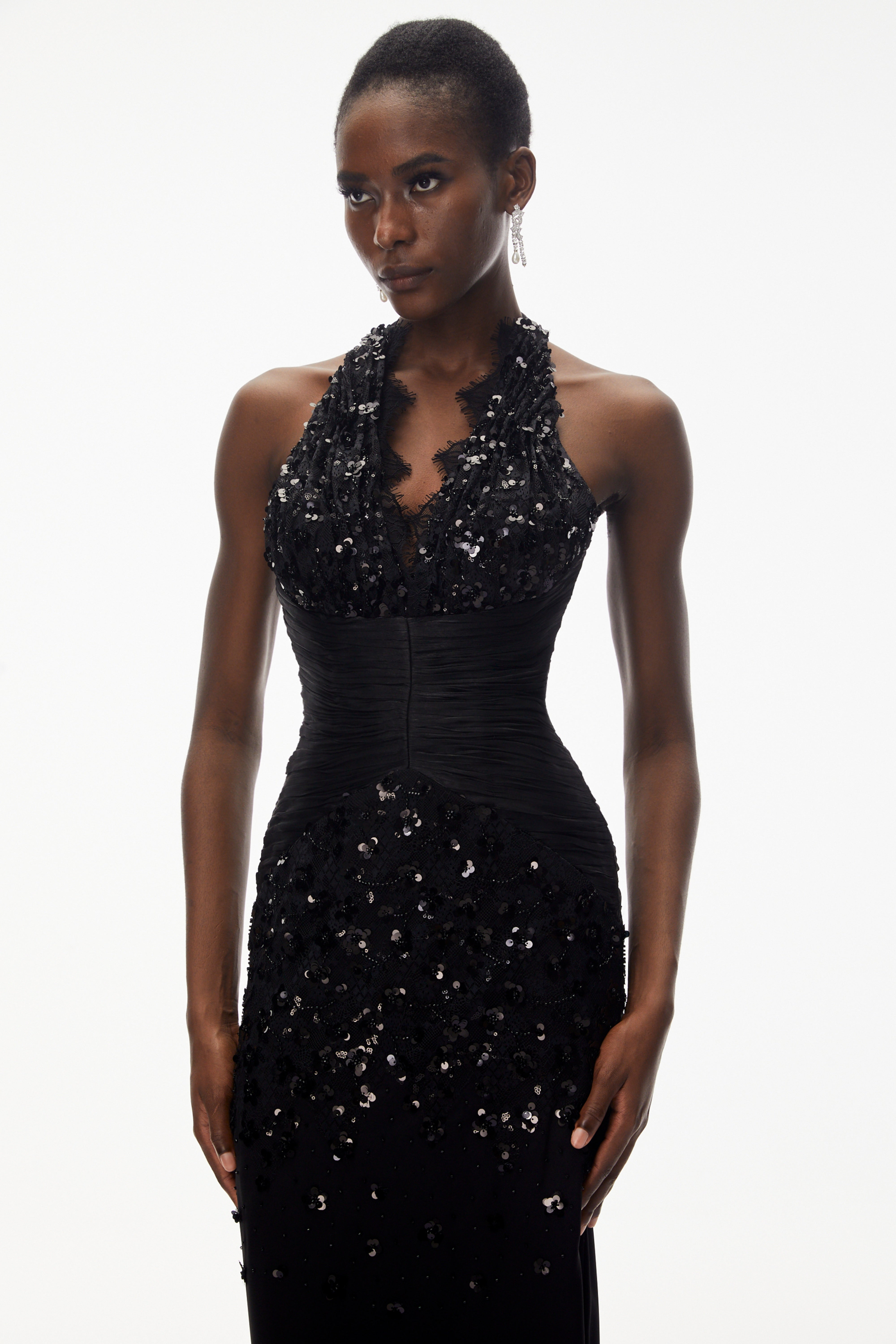 Black sequined halter gown with lace trim