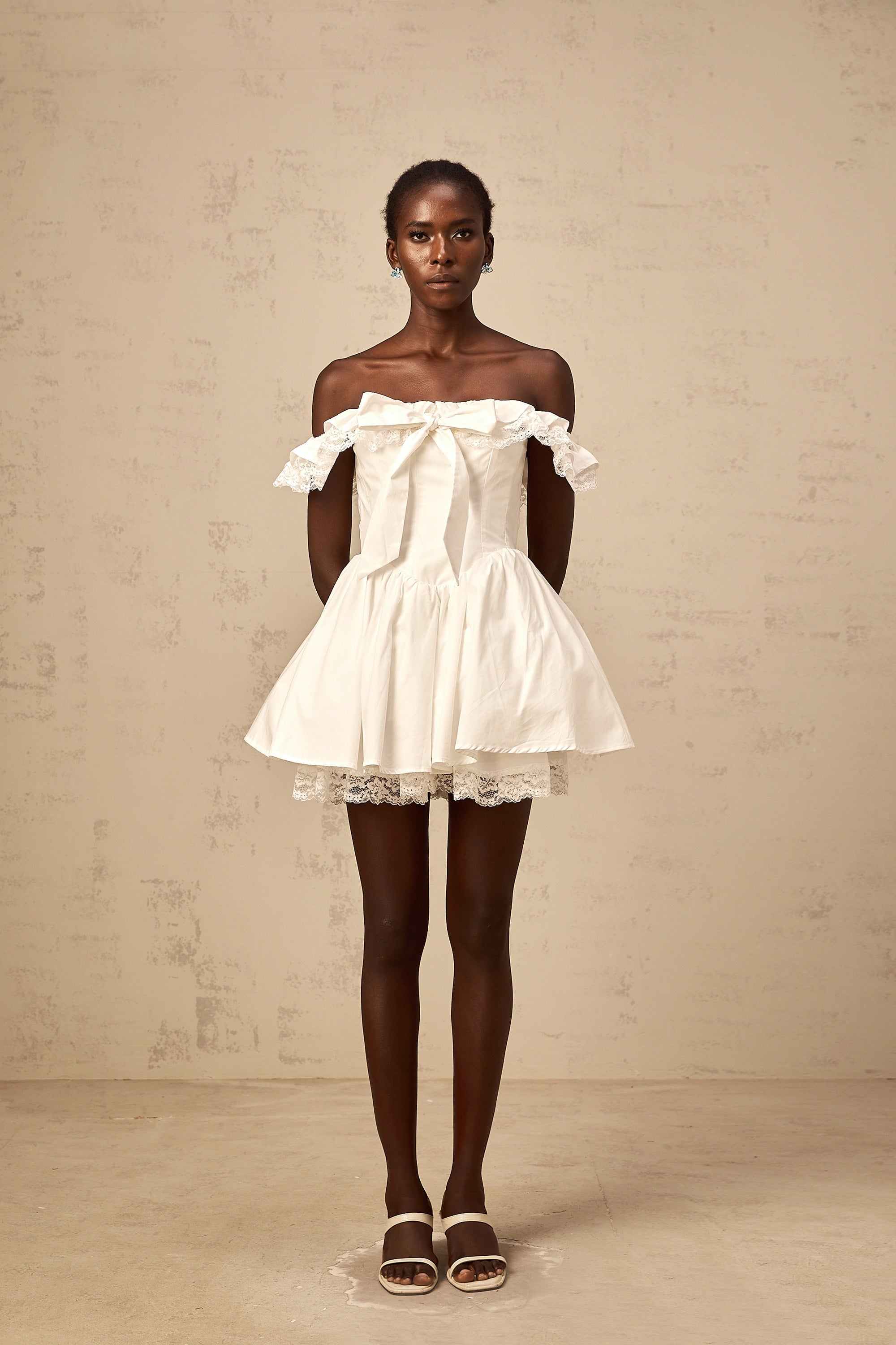 Arsène white oversize-bow ruffled mini dress (Final Sale)