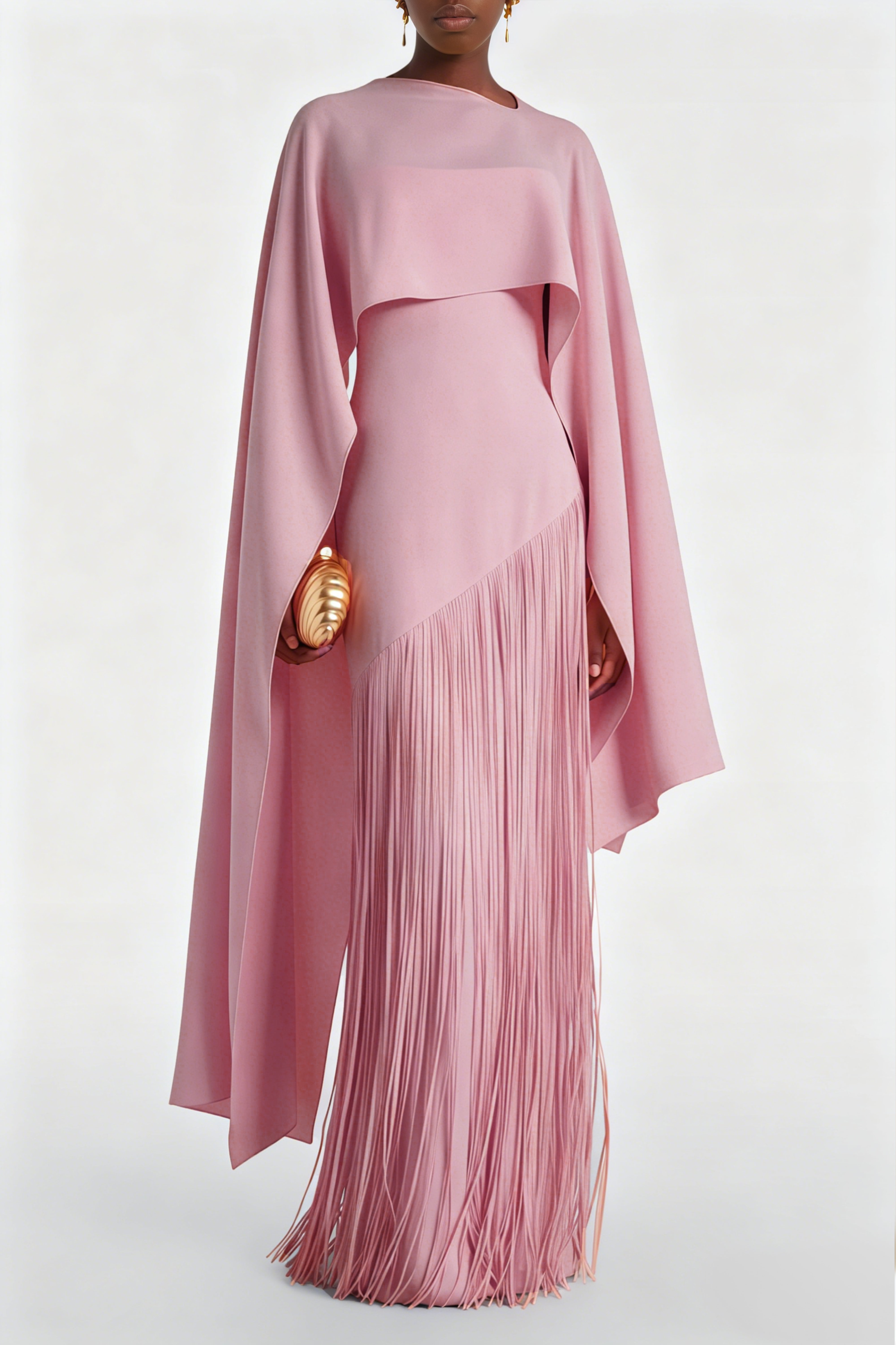 Mauve pink cape-style gown with a long fringed skirt
