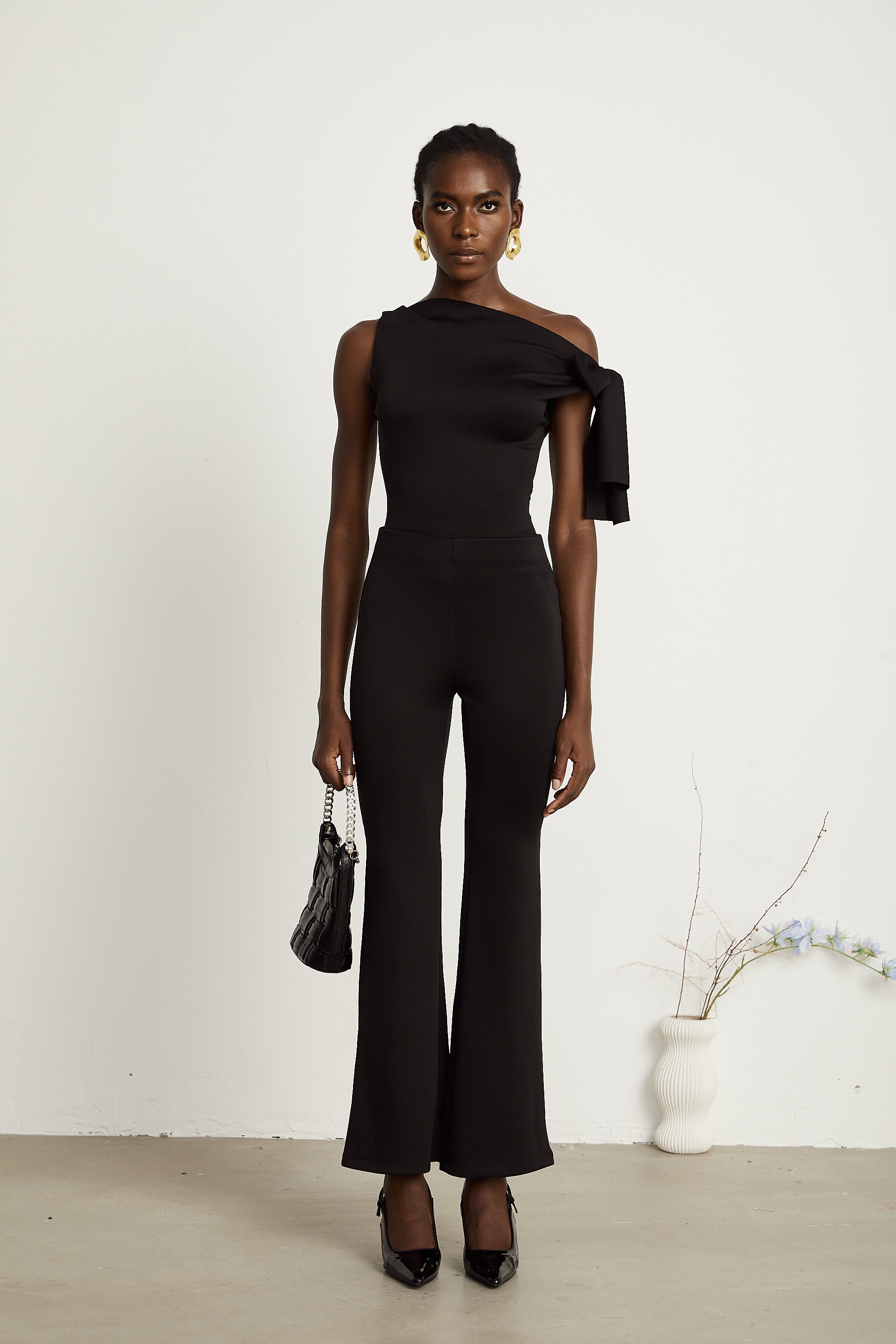 Ensemble coordonné Clotilde : haut et pantalon en maille noire (Vente définitive - États-Unis uniquement)